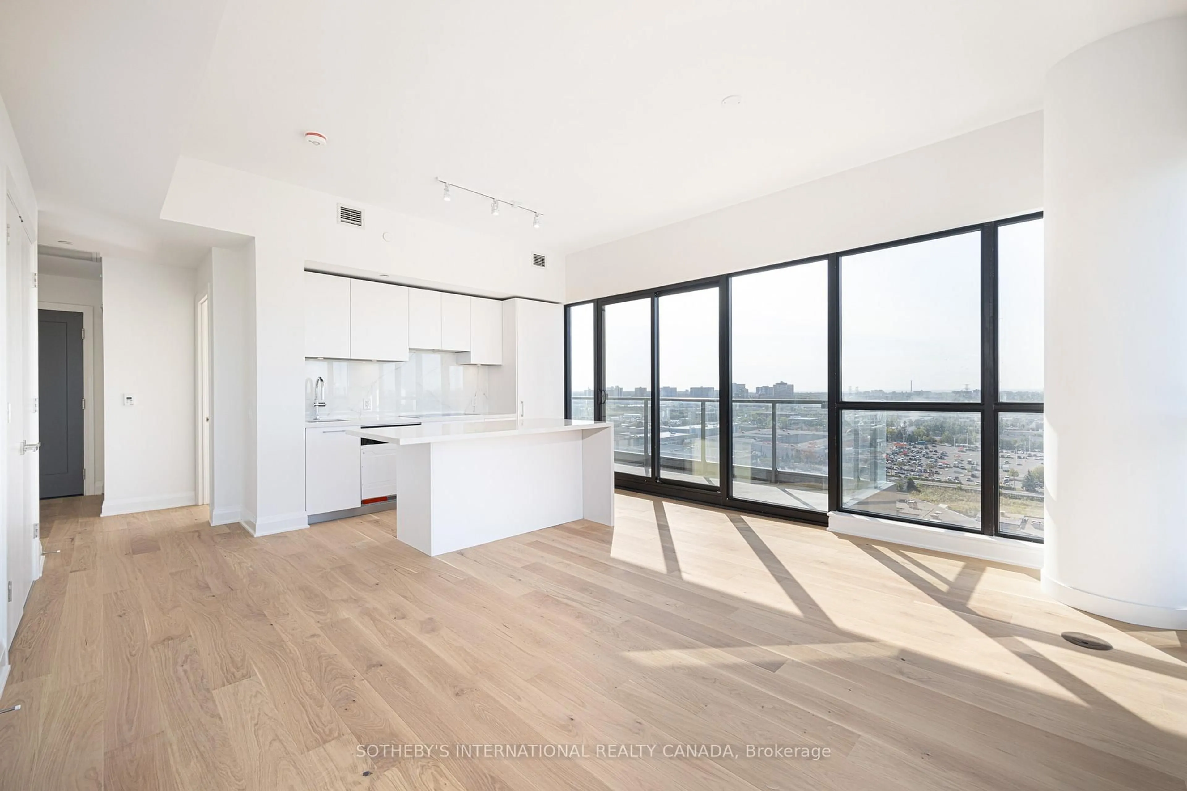 Open concept kitchen, wood/laminate floor for 33 Frederick Todd Way #1501, Toronto Ontario M5A 4A9