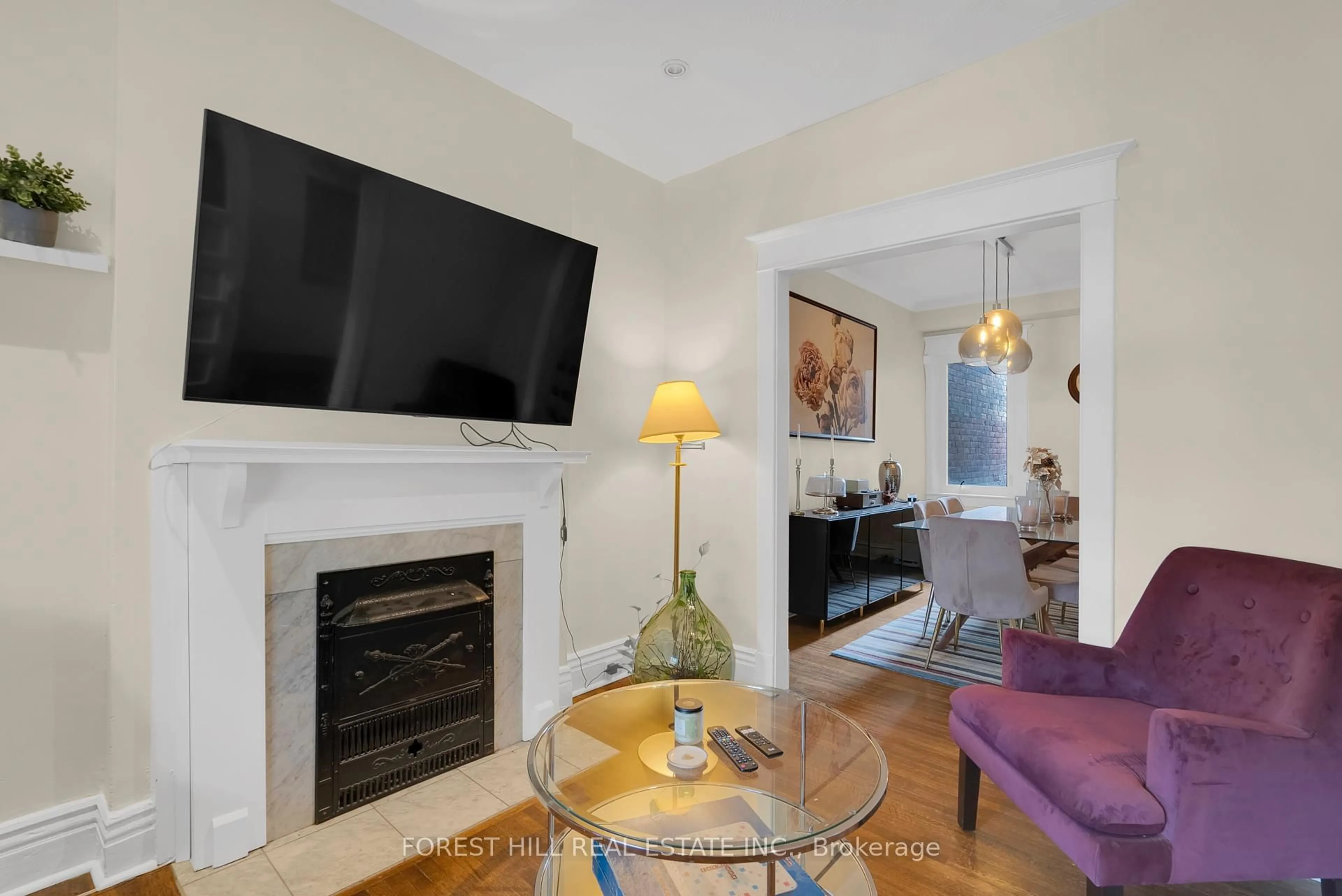 Living room with furniture, ceramic/tile floor for 169 Rushton Rd, Toronto Ontario M6G 3H9