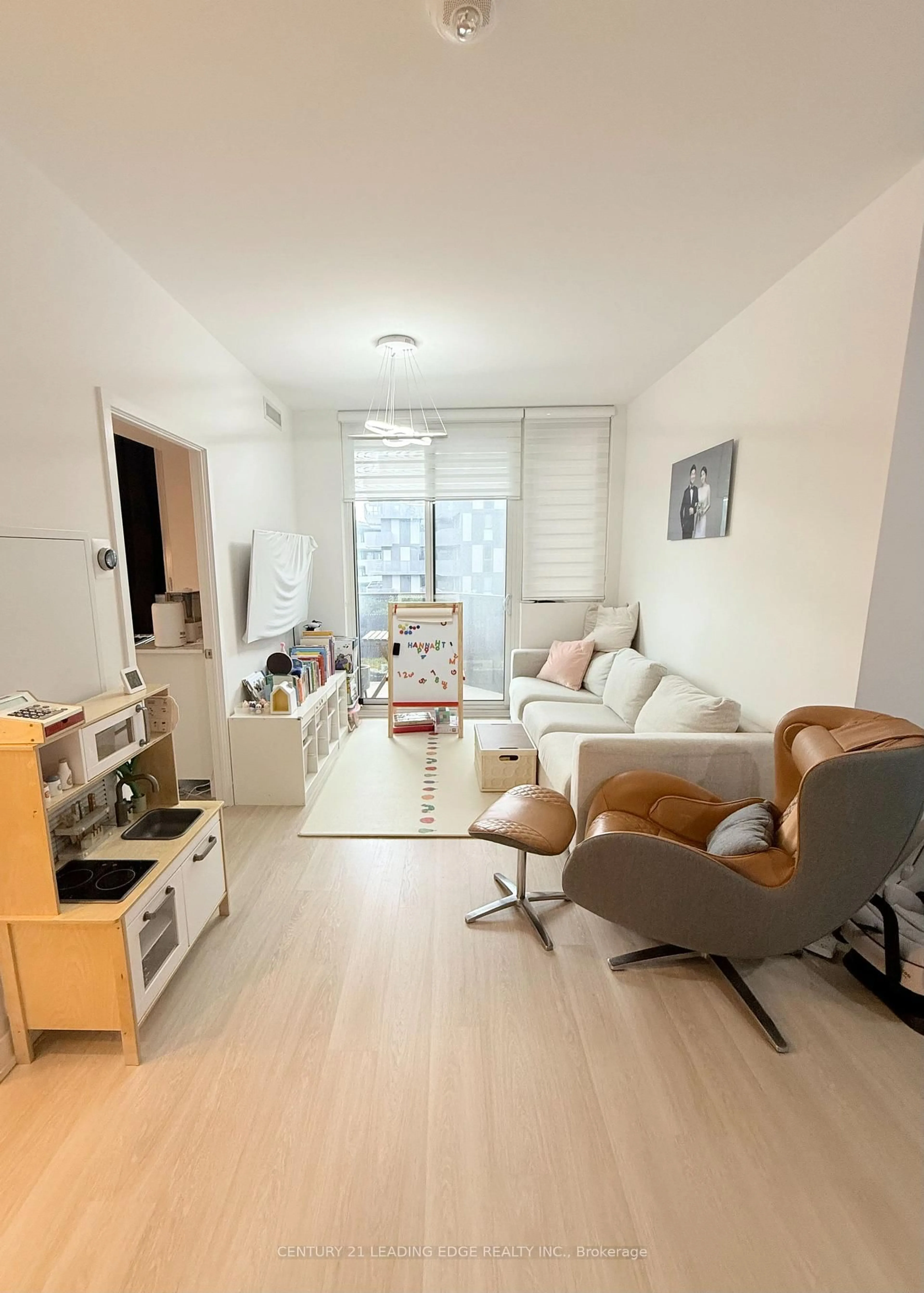 Living room with furniture, unknown for 30 Tretti Way #904, Toronto Ontario M3H 0E3