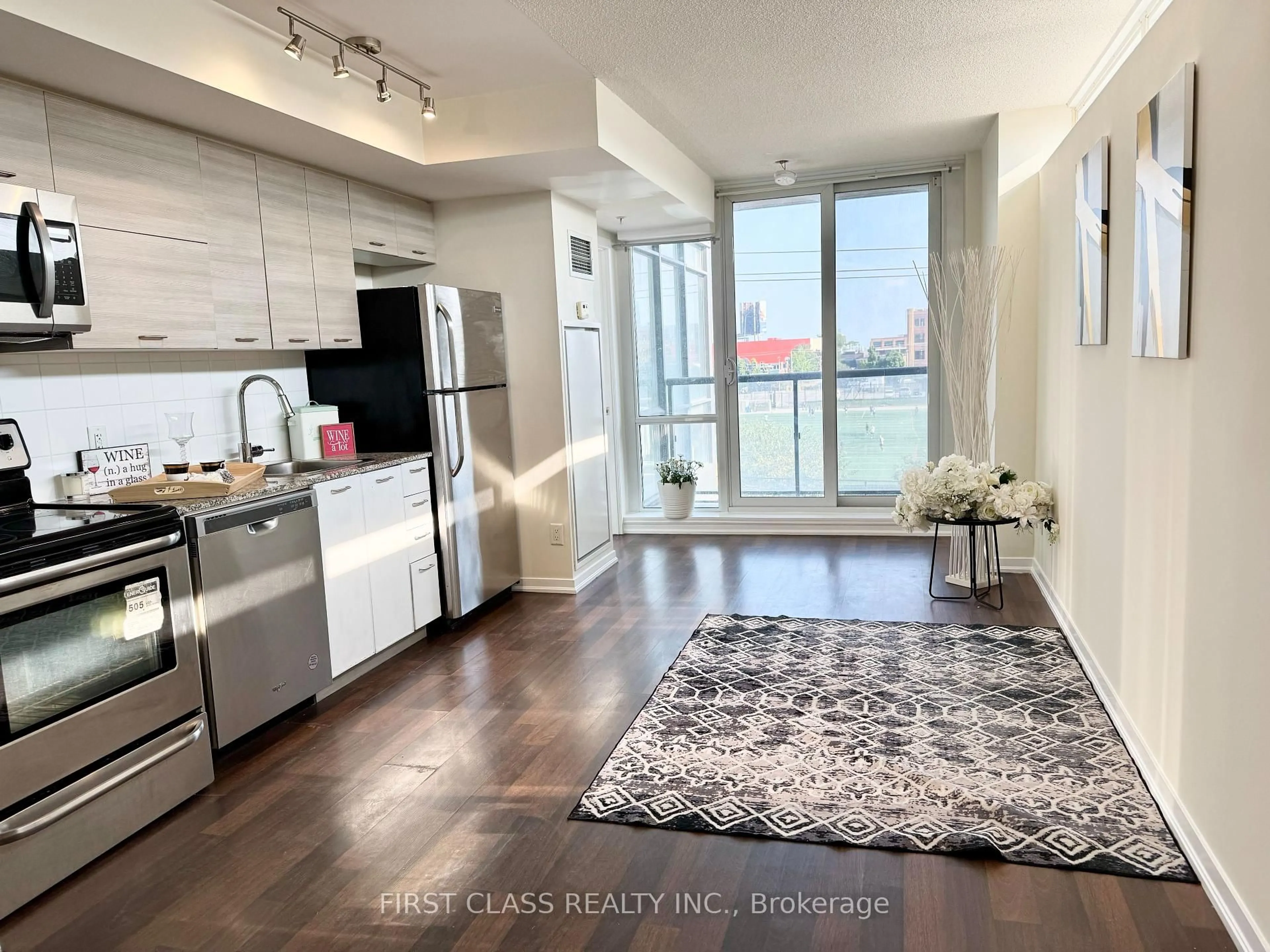 Open concept kitchen, unknown for 20 Joe Shuster Way #313, Toronto Ontario M6K 0A3