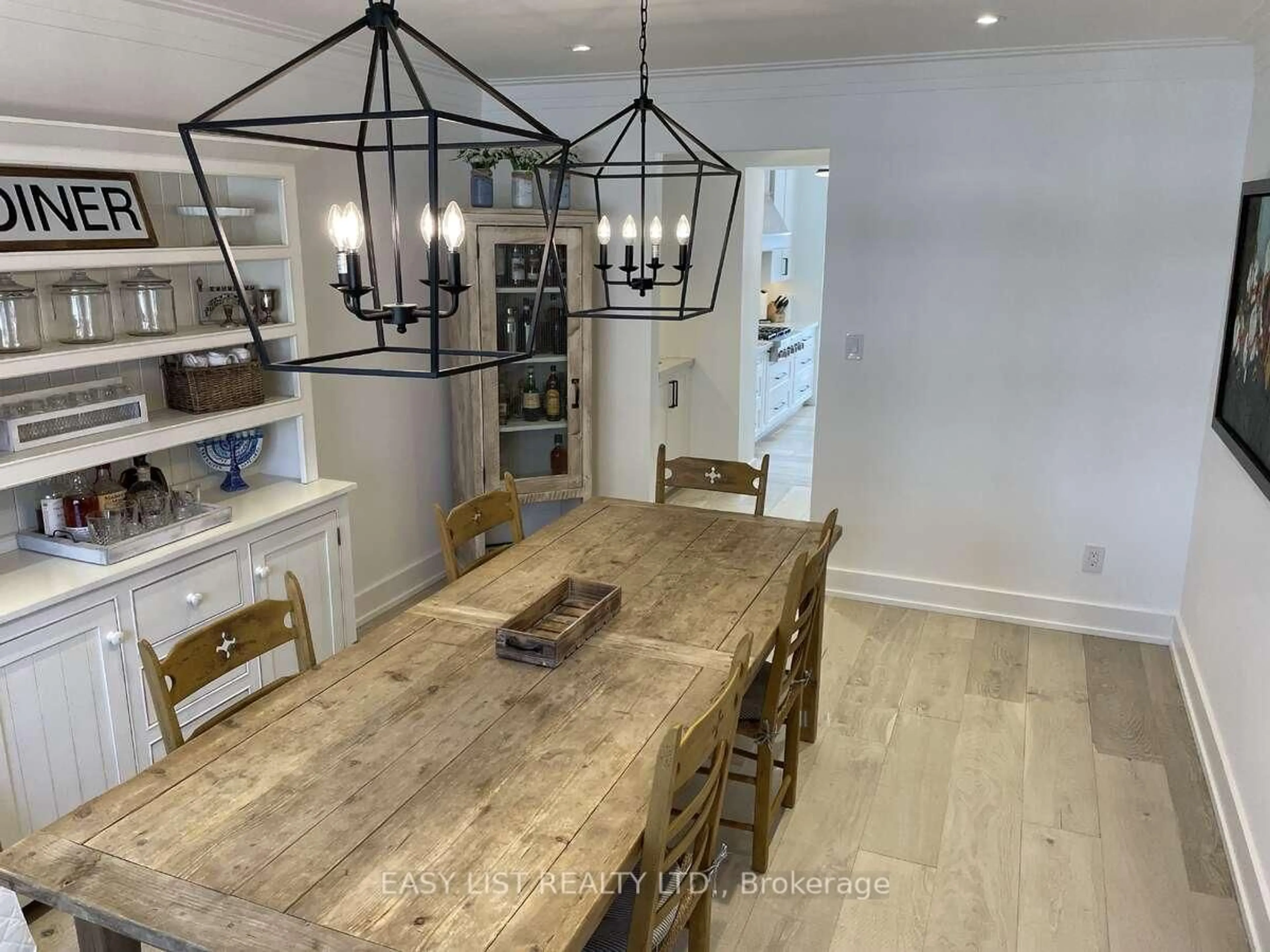 Dining room, wood/laminate floor for 39 Romney Rd, Toronto Ontario M3H 1H4