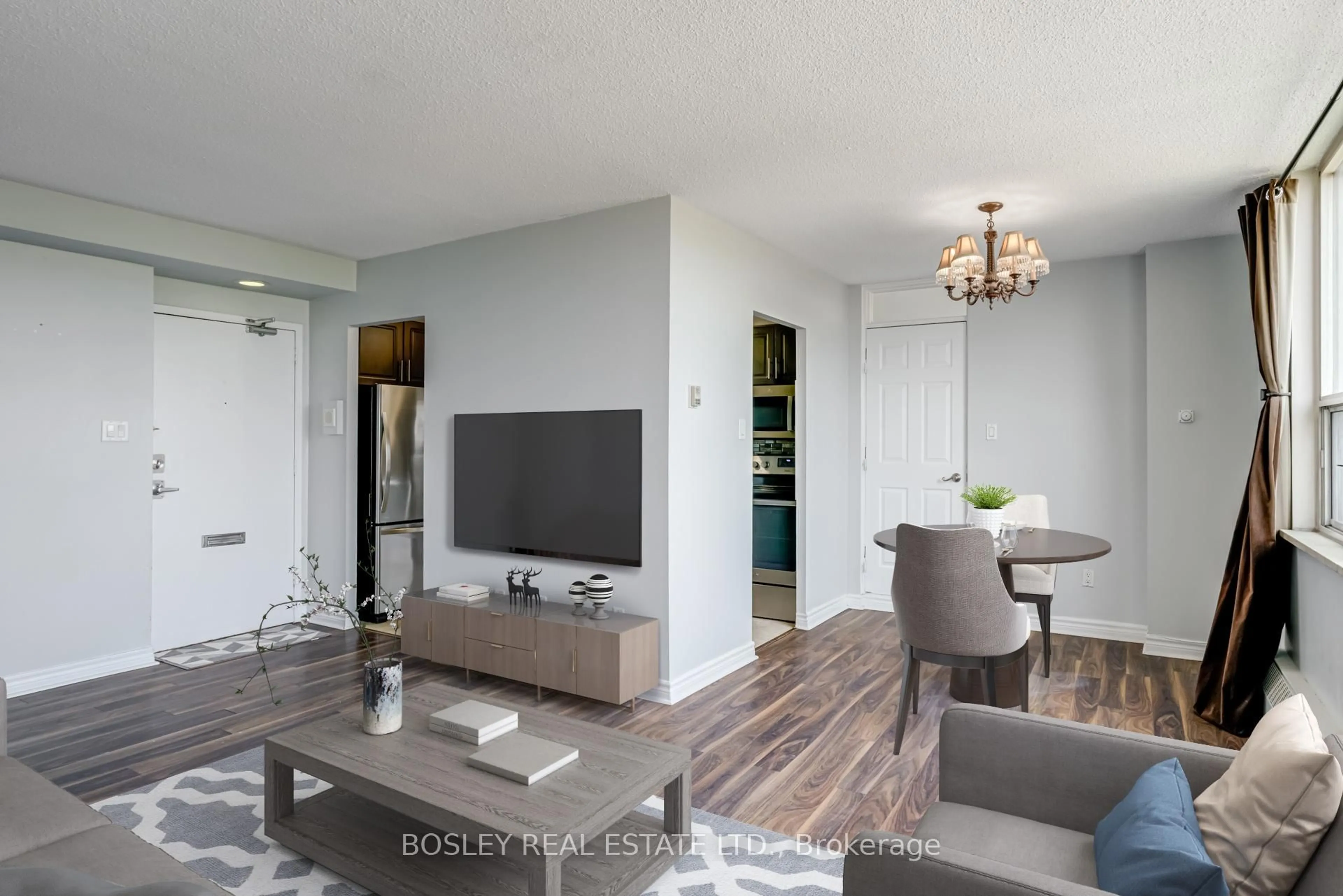 Living room with furniture, wood/laminate floor for 5 Parkway Forest Dr #801, Toronto Ontario M2J 1L2