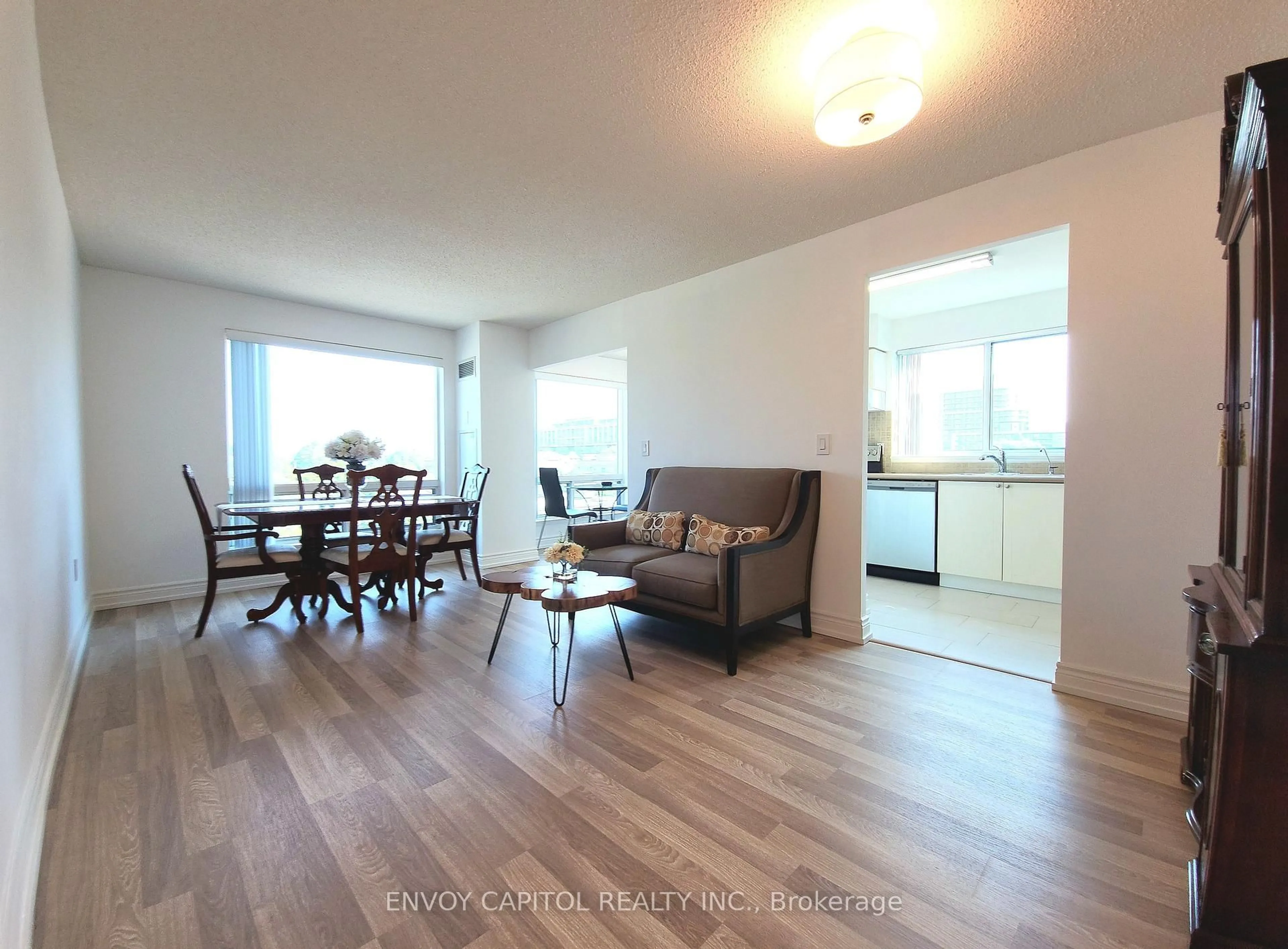Living room with furniture, wood/laminate floor for 1 Hycrest Ave #602, Toronto Ontario M2N 6V8