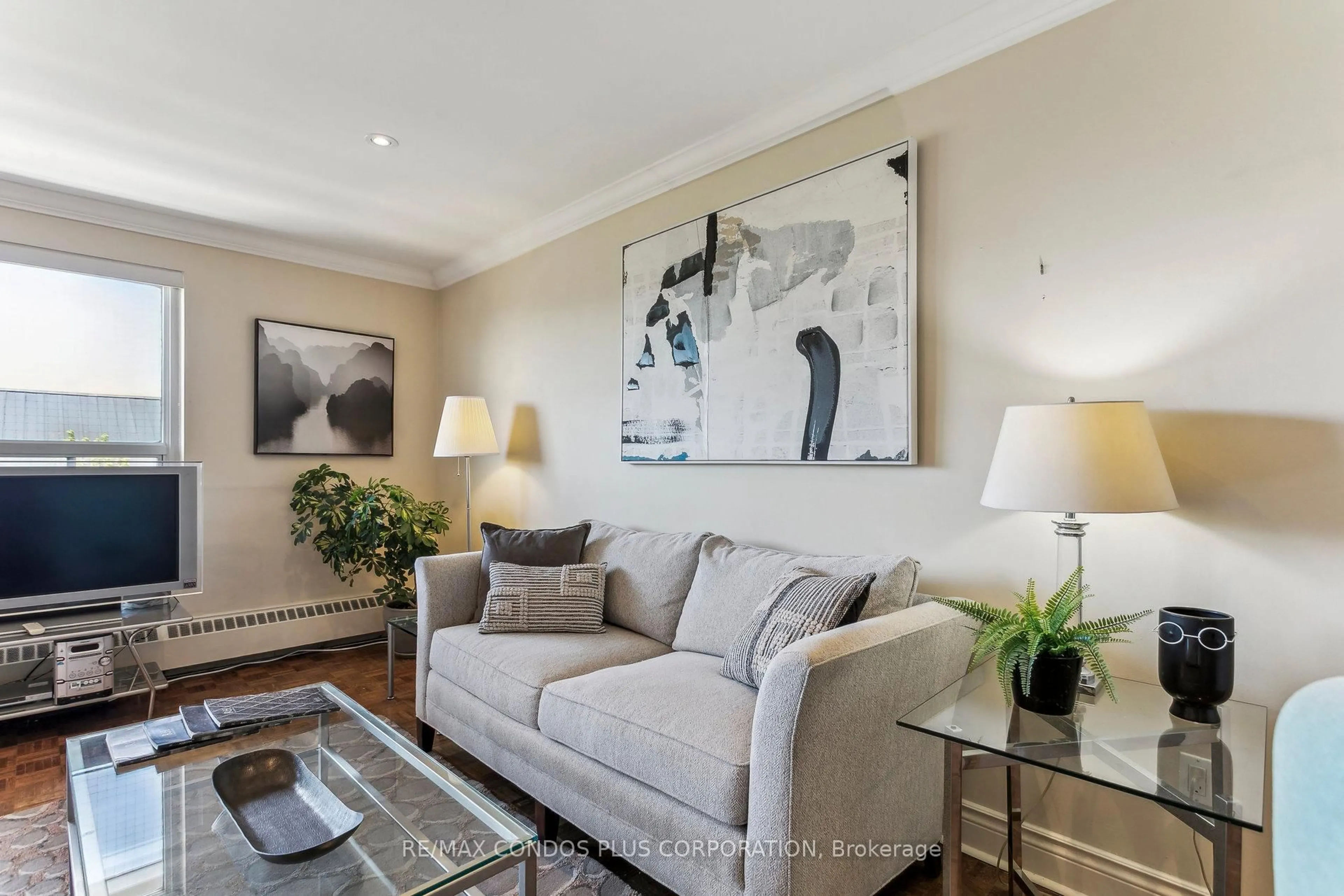 Living room with furniture, unknown for 71 Jonesville Cres #409, Toronto Ontario M4A 1H1