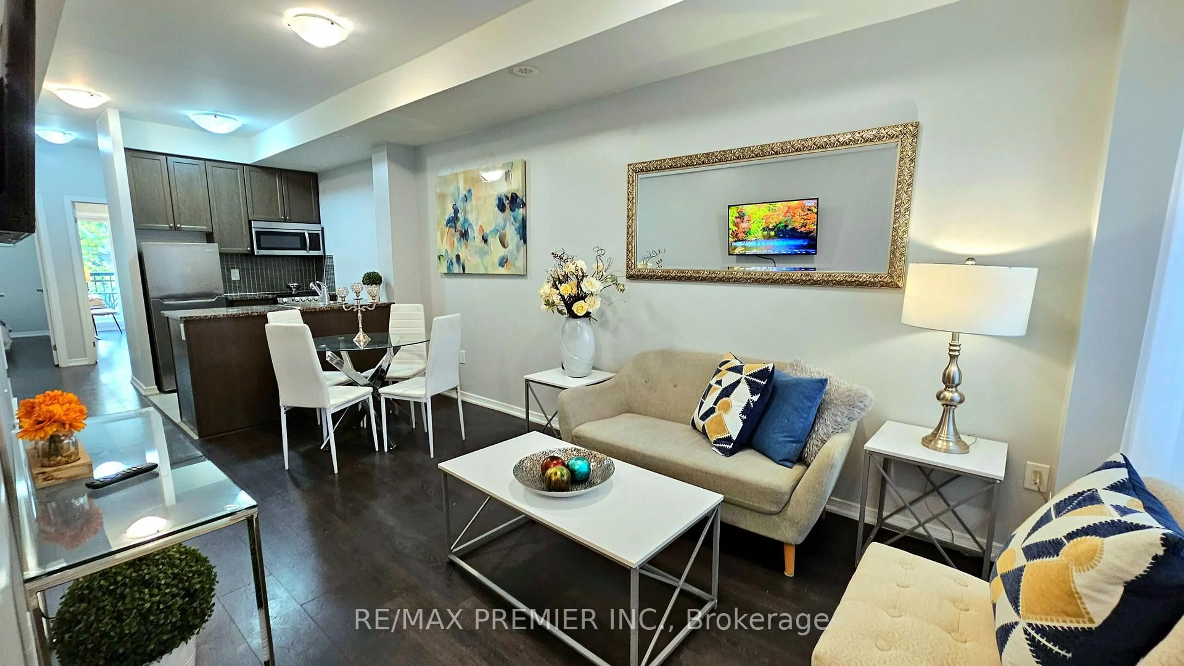 Living room with furniture, unknown for 19 Coneflower Cres #272, Toronto Ontario M2R 0A4