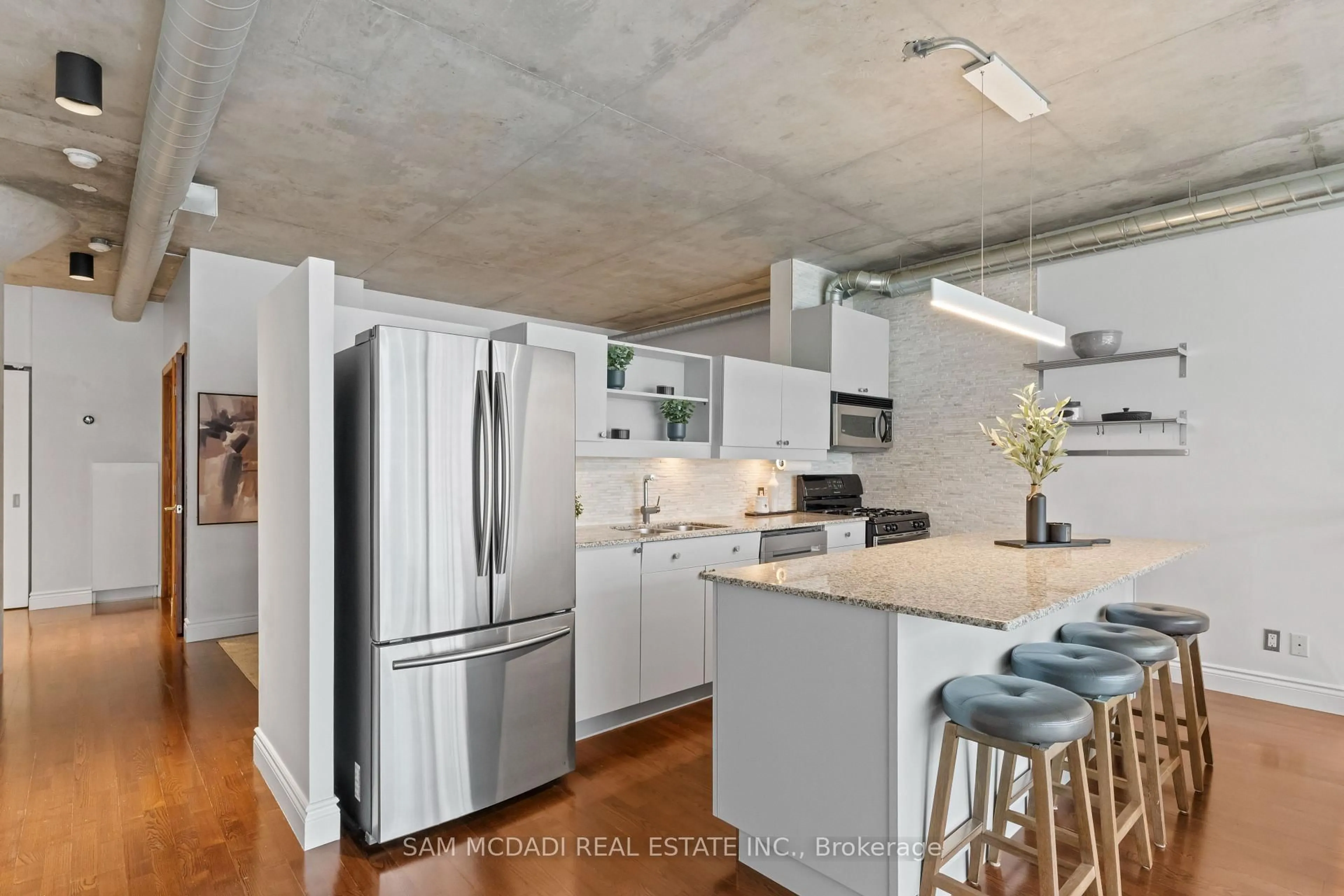 Open concept kitchen, cement floor for 42 Camden St #204, Toronto Ontario M5V 1V1