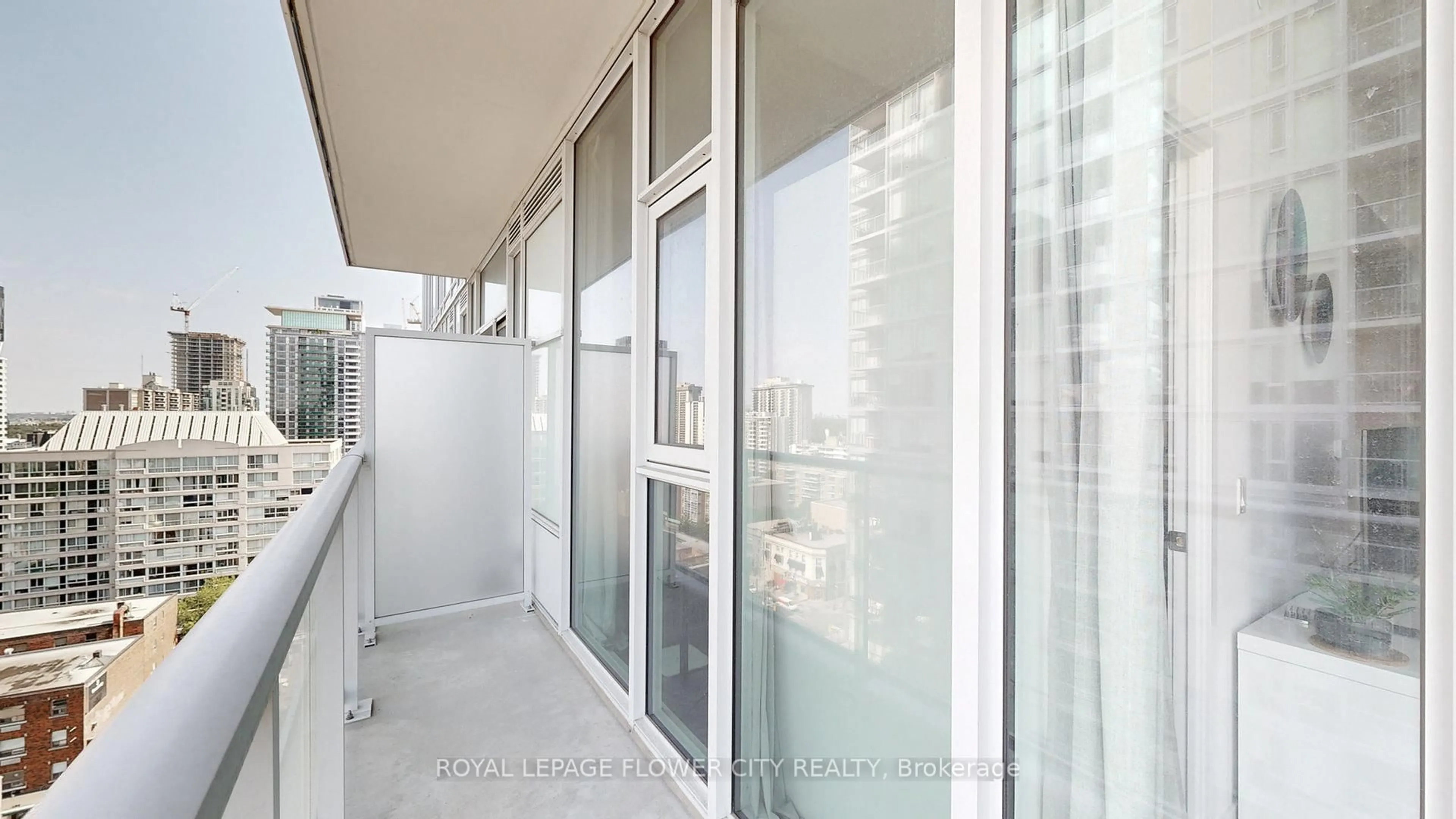 Balcony in the apartment, city buildings view from balcony for 33 Helendale Ave #1101, Toronto Ontario M4R 1C5