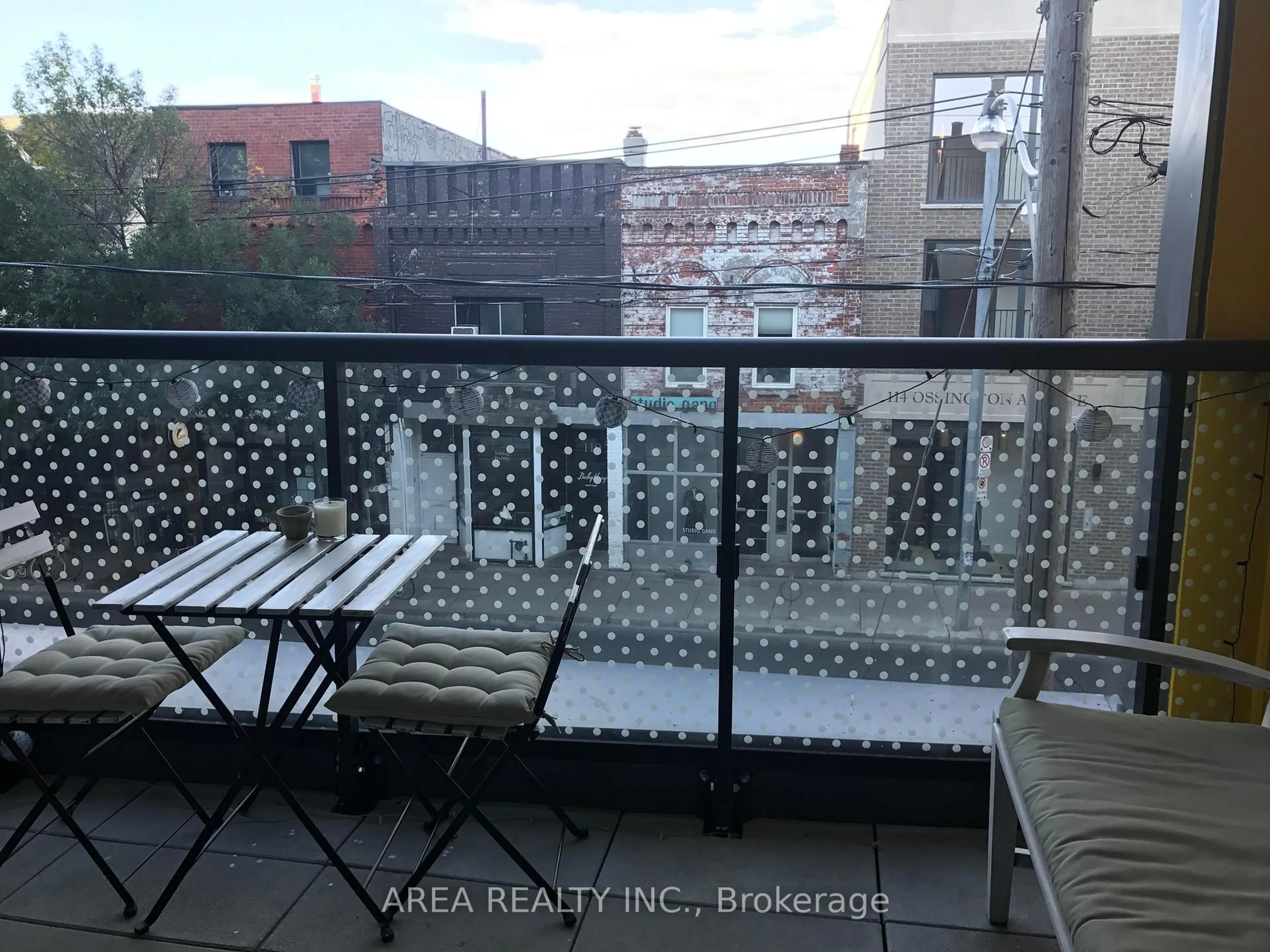 Balcony in the apartment, city buildings view from balcony for 109 Ossington Ave #210, Toronto Ontario M6J 0G1