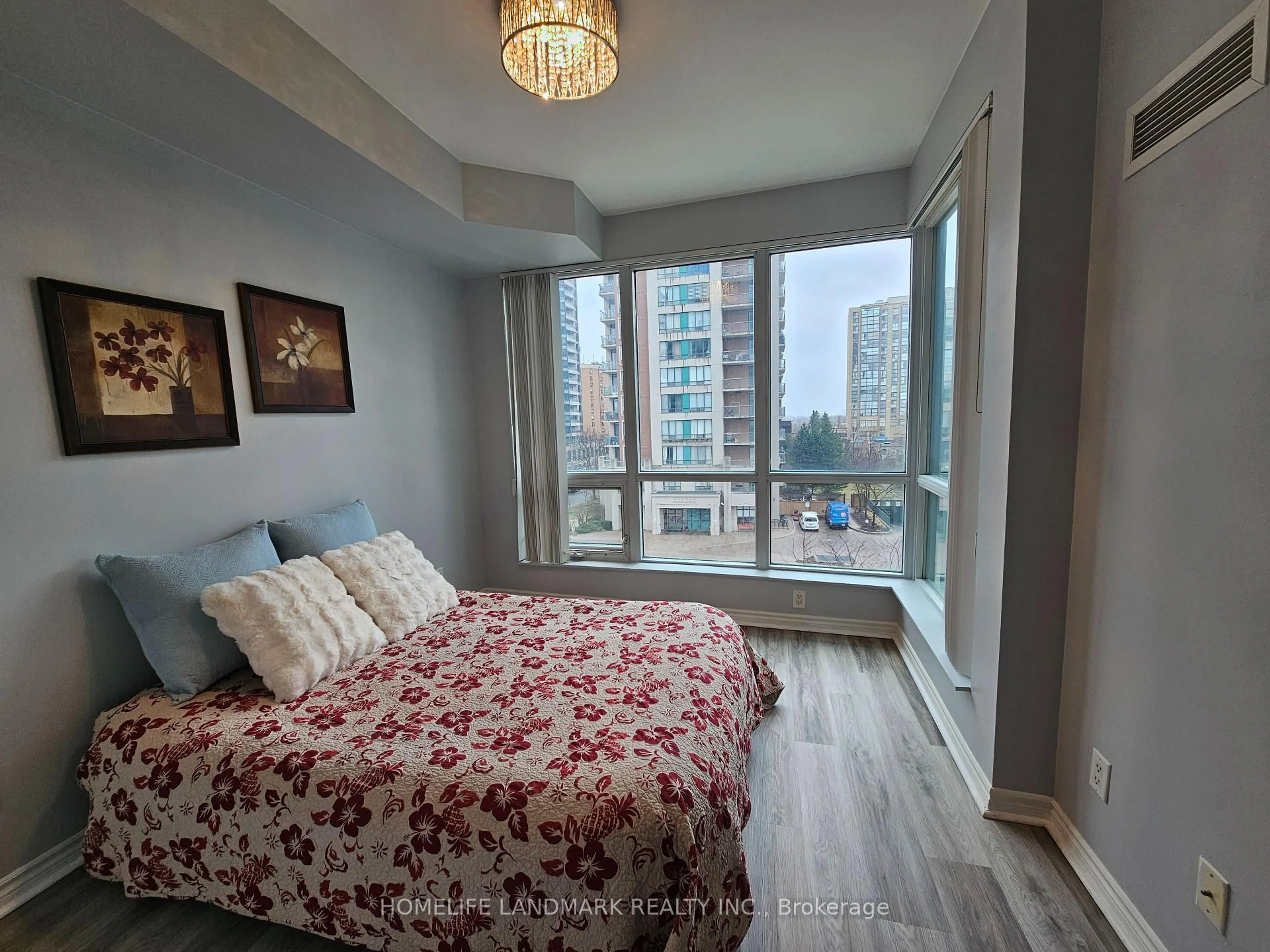 Bedroom with bed, wood/laminate floor for 60 Byng Ave #401, Toronto Ontario M2N 7K3