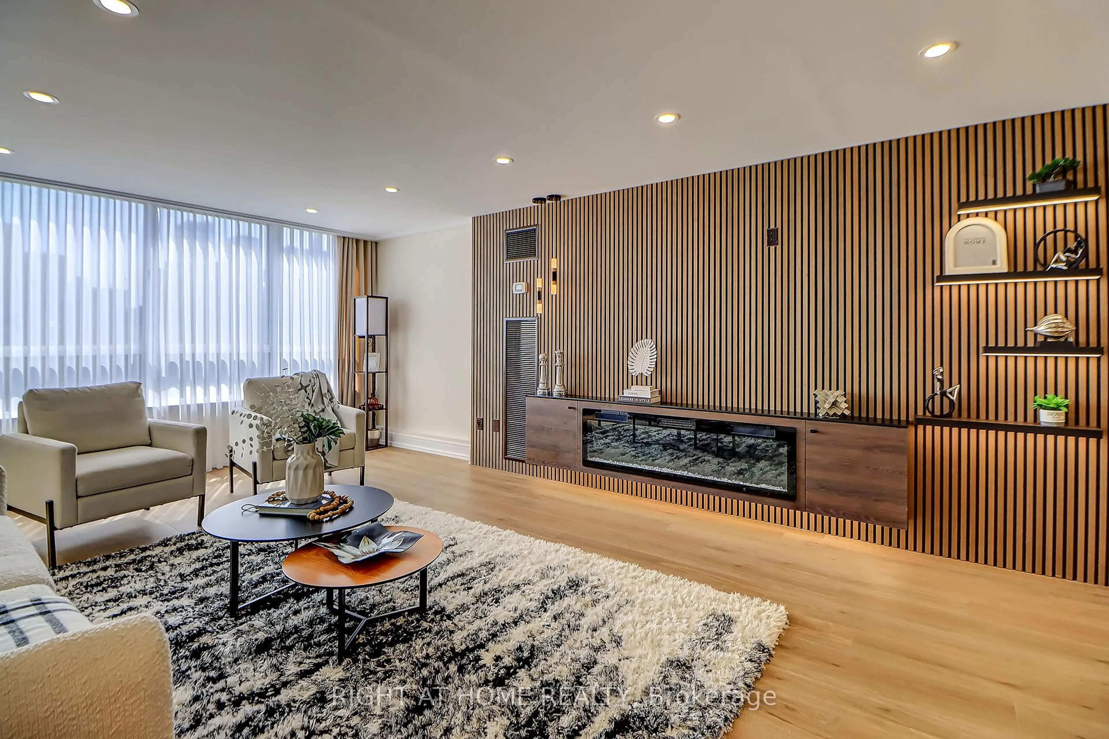 Living room with furniture, wood/laminate floor for 130 Carlton St #1207, Toronto Ontario M5A 4K3