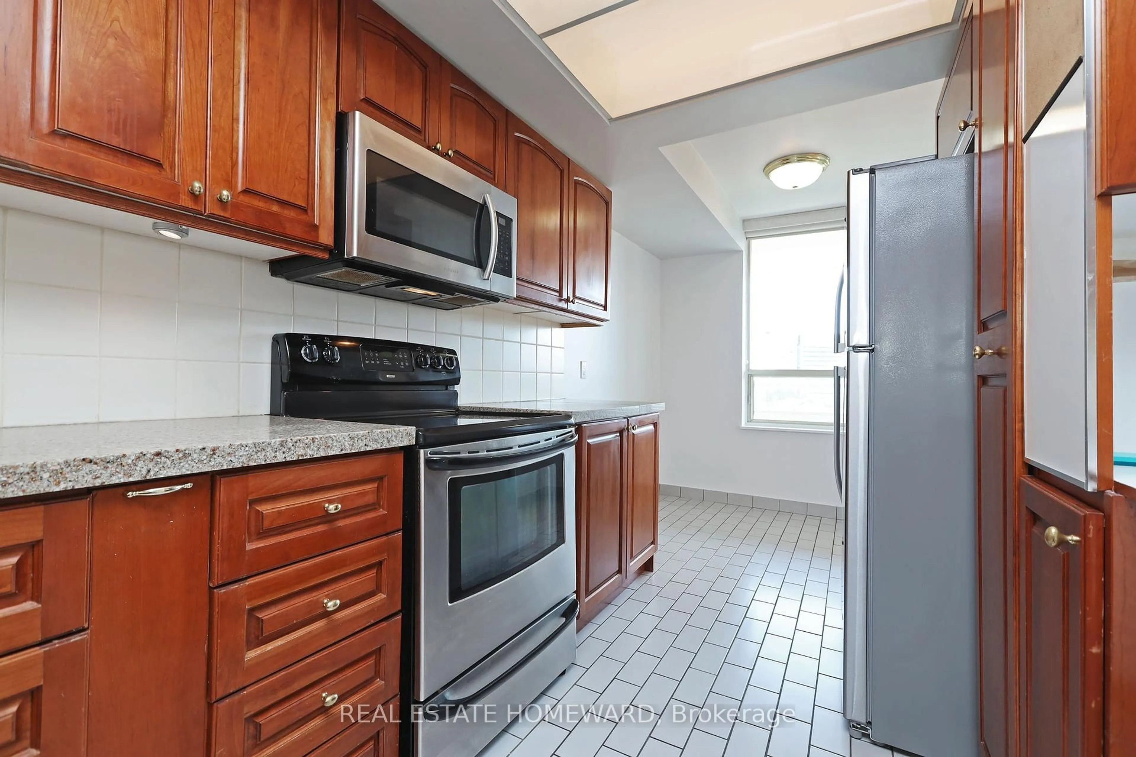 Standard kitchen, ceramic/tile floor for 215 Wynford Dr #801, Toronto Ontario M3C 3P5
