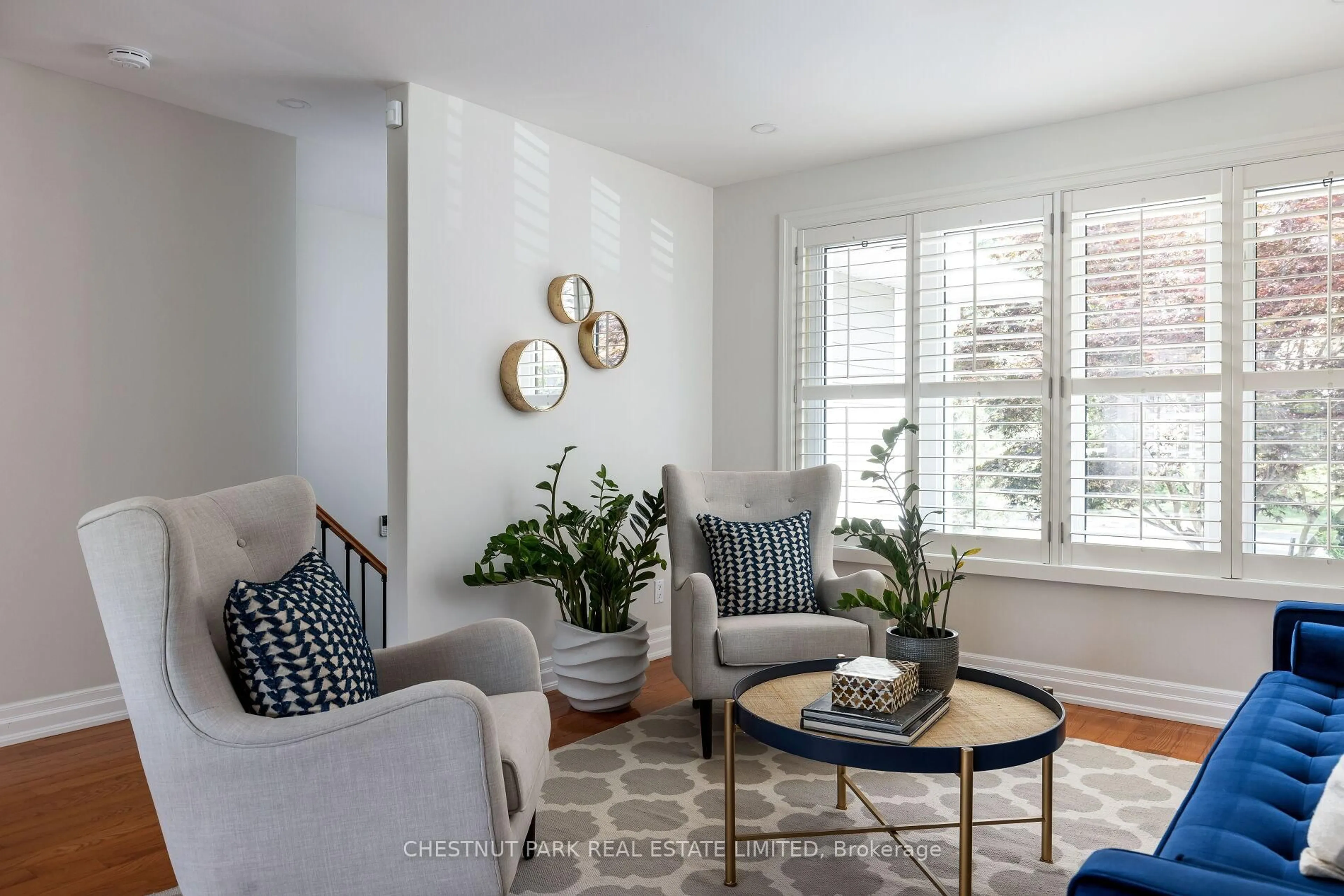 Living room with furniture, unknown for 75 Paperbirch Dr, Toronto Ontario M3C 2E6
