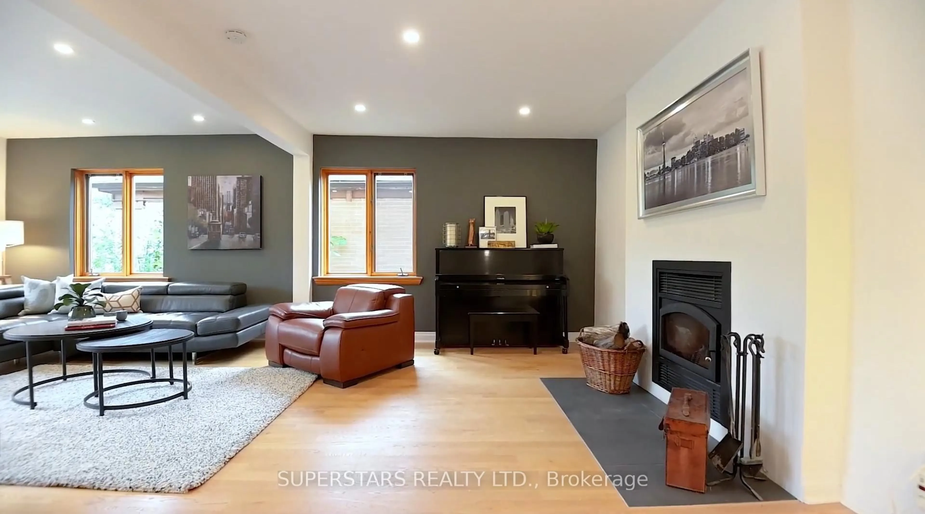 Living room with furniture, wood/laminate floor for 51 Abitibi Ave, Toronto Ontario M2M 2V3