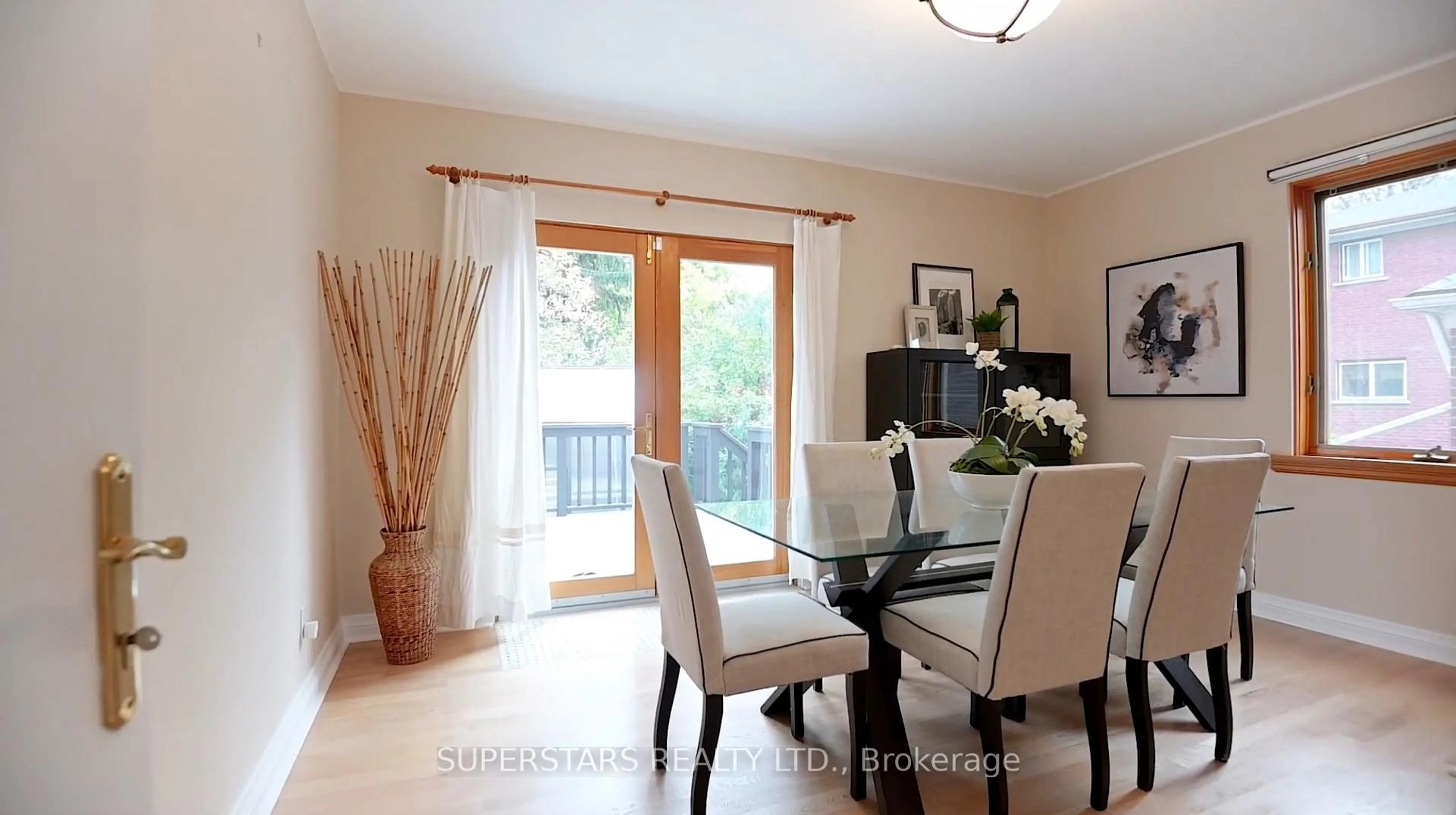 Dining room, wood/laminate floor for 51 Abitibi Ave, Toronto Ontario M2M 2V3