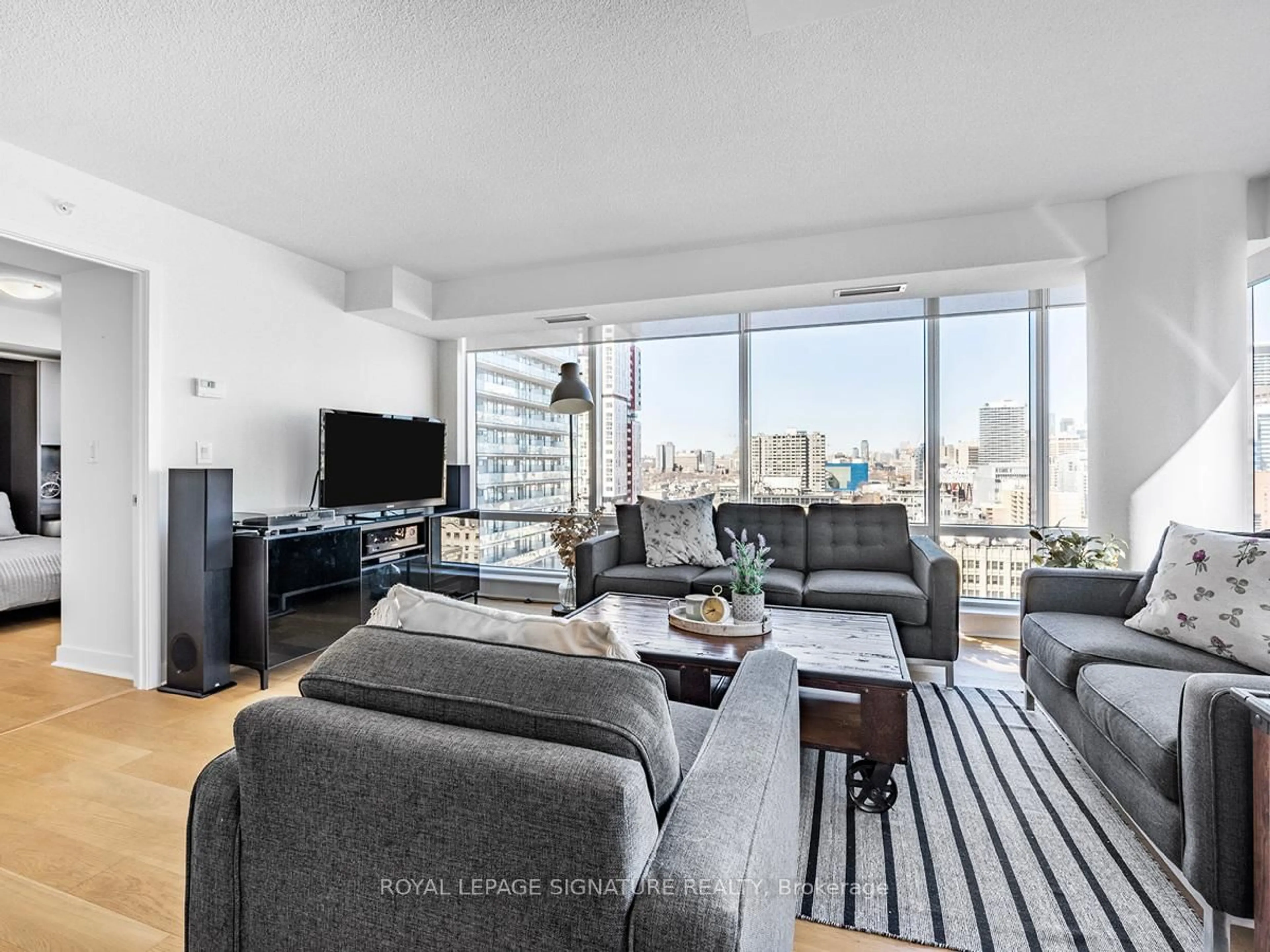 Living room with furniture, unknown for 295 Adelaide St #1804, Toronto Ontario M5V 0L4