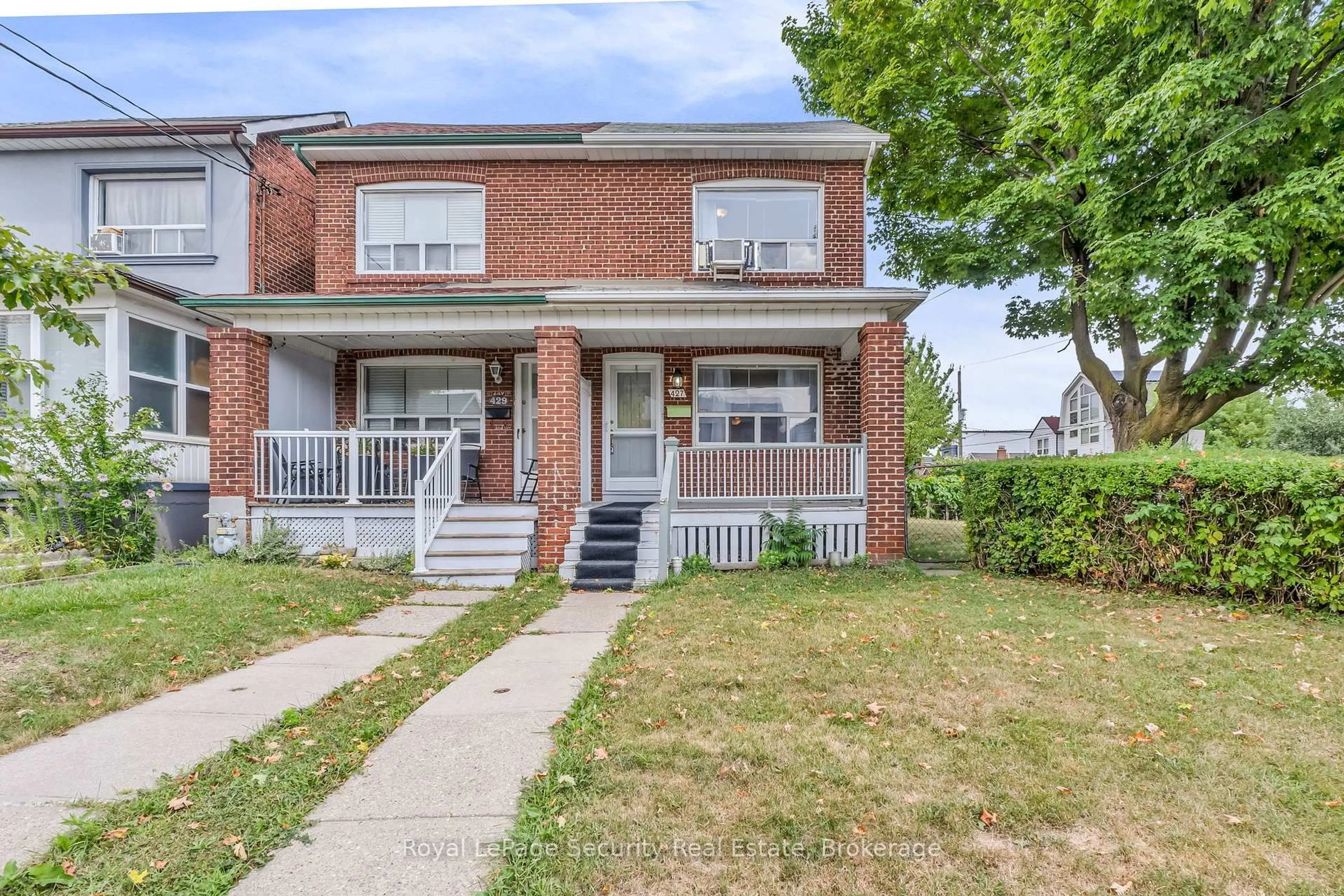 Home with brick exterior material, street for 427 Glenholme Ave, Toronto Ontario M6E 3E9