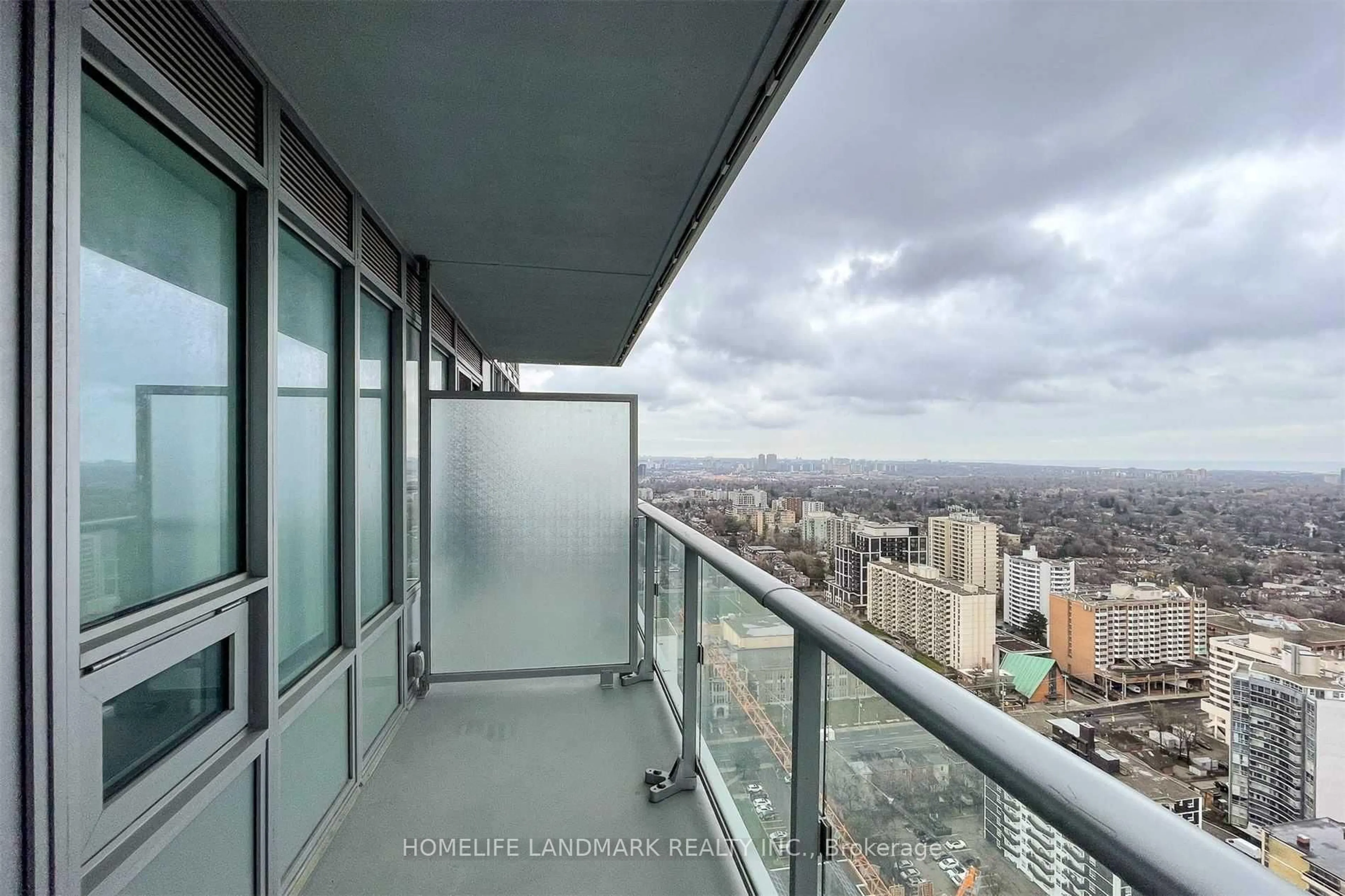 Balcony in the apartment, city buildings view from balcony for 99 Broadway Ave #1612, Toronto Ontario M4P 0E3