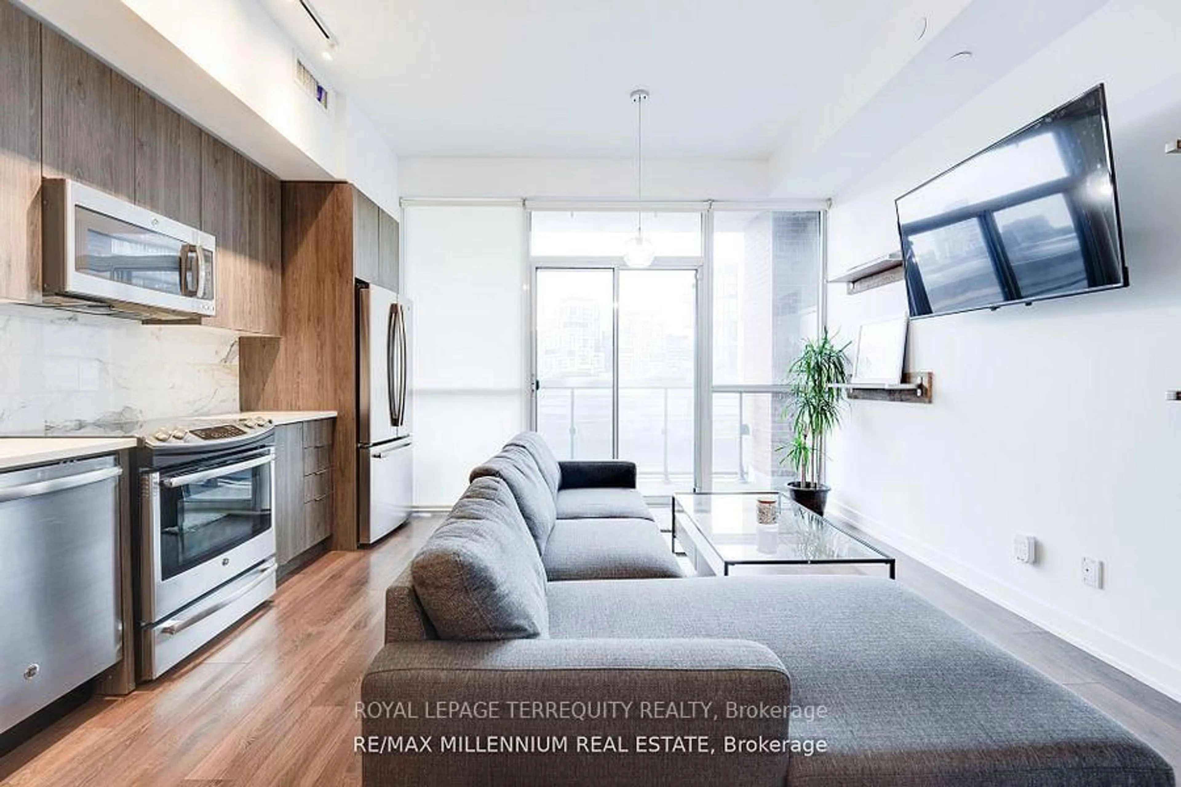 Living room with furniture, unknown for 50 Bruyeres Mews #710, Toronto Ontario M5V 0H8