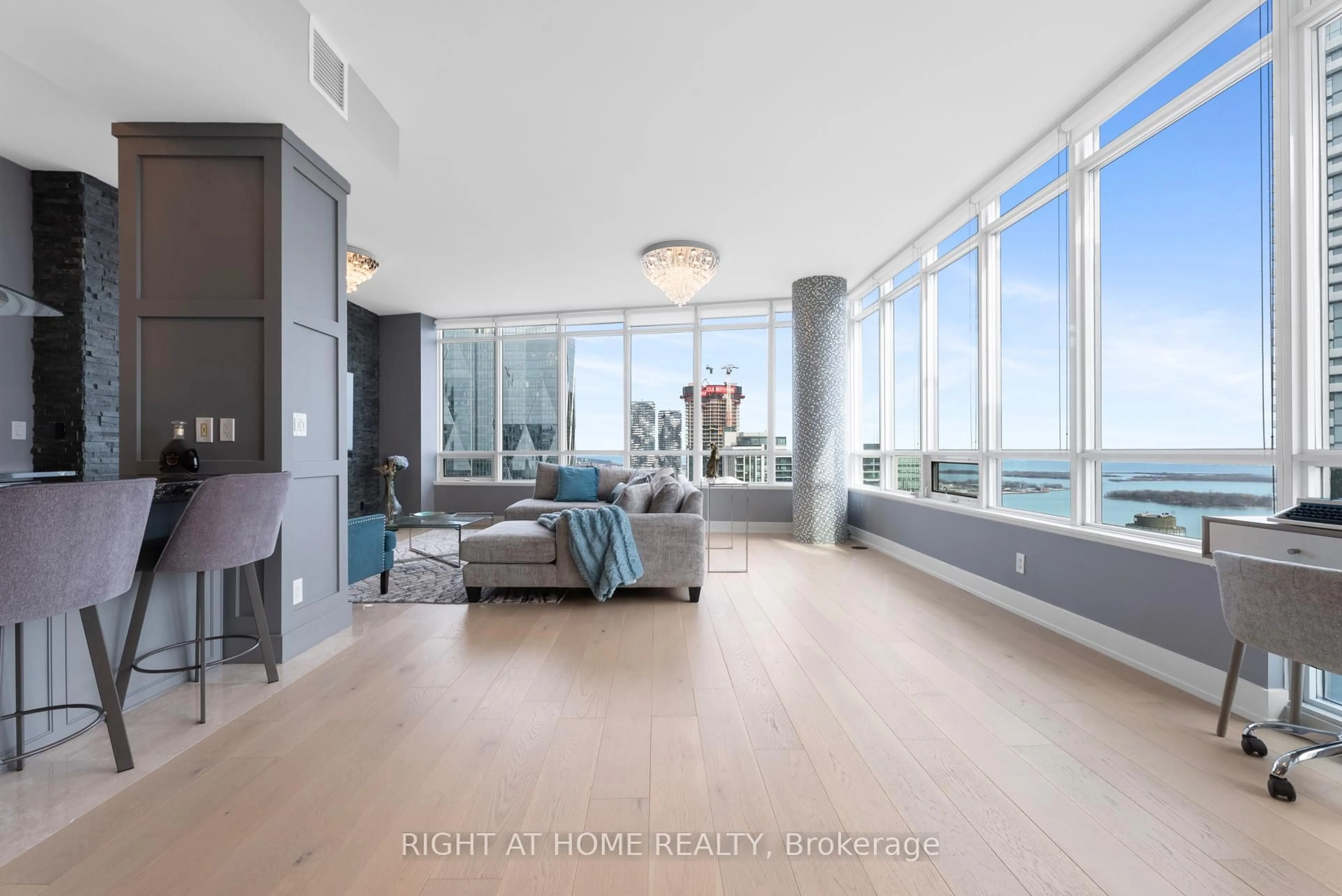 Living room with furniture, unknown for 65 Bremner Blvd #5104, Toronto Ontario M5J 0A7