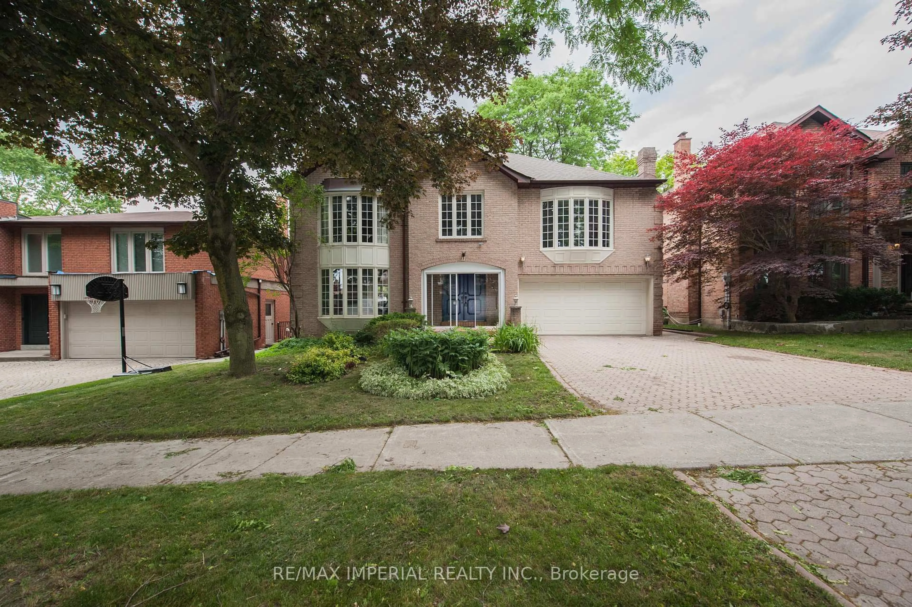 Home with brick exterior material, street for 11 Riderwood Dr, Toronto Ontario M2L 2X4
