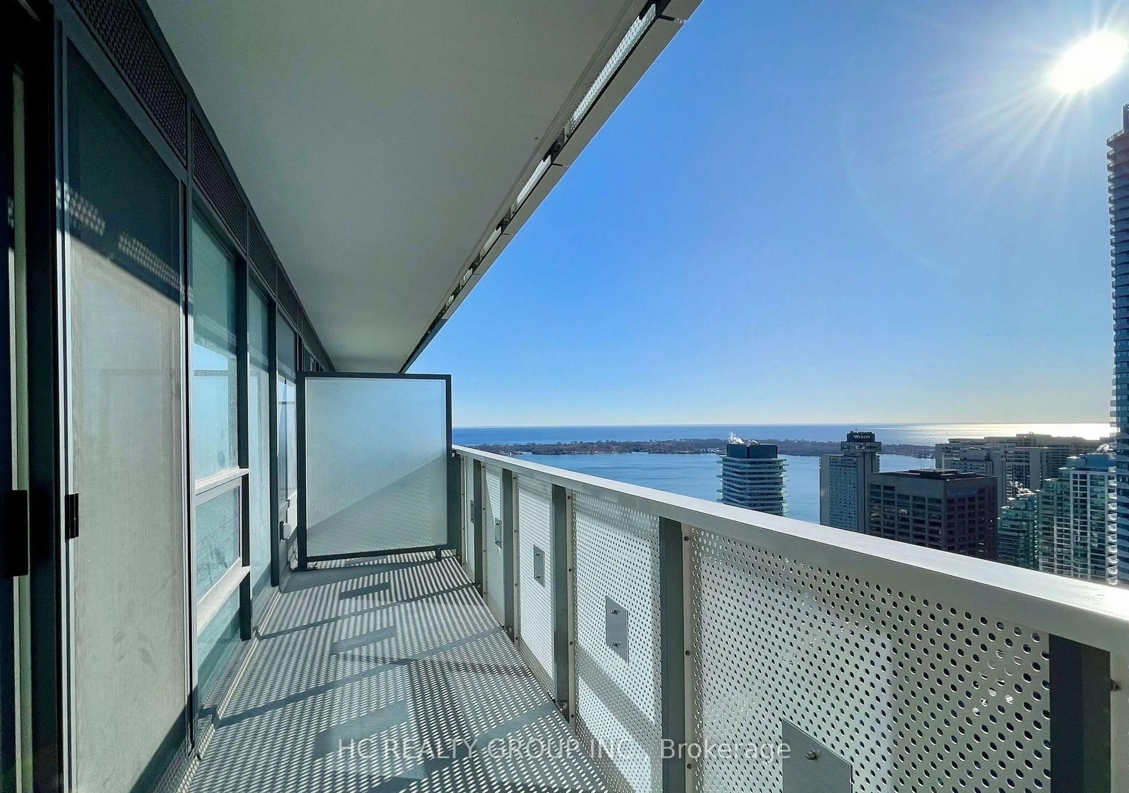 Balcony in the apartment, city buildings view from balcony for 55 Cooper St #4715, Toronto Ontario M5E 0G1