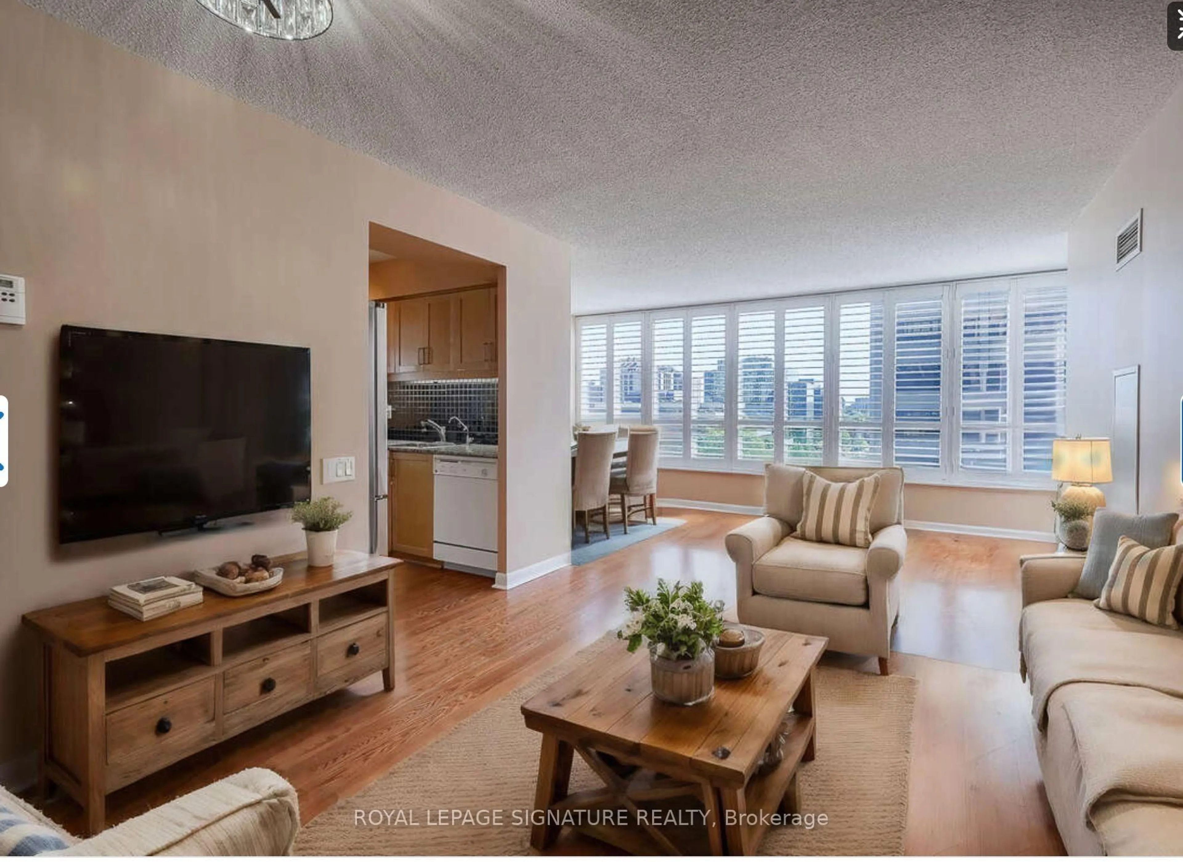 Living room with furniture, wood/laminate floor for 33 Sheppard Ave #910, Toronto Ontario M2N 7K1