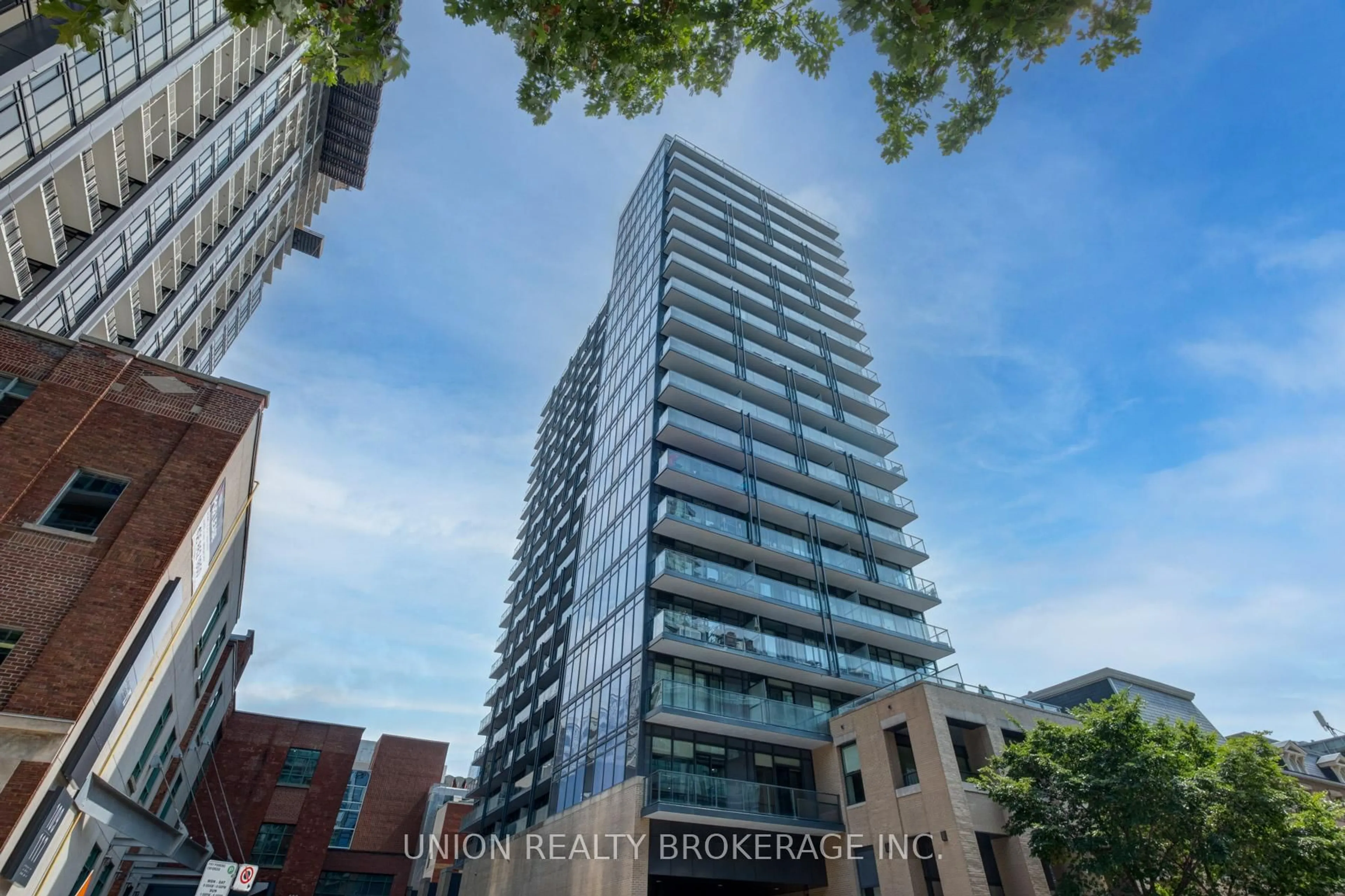 A pic from outside/outdoor area/front of a property/back of a property/a pic from drone, city buildings view from balcony for 105 George St #405, Toronto Ontario M5A 0L4