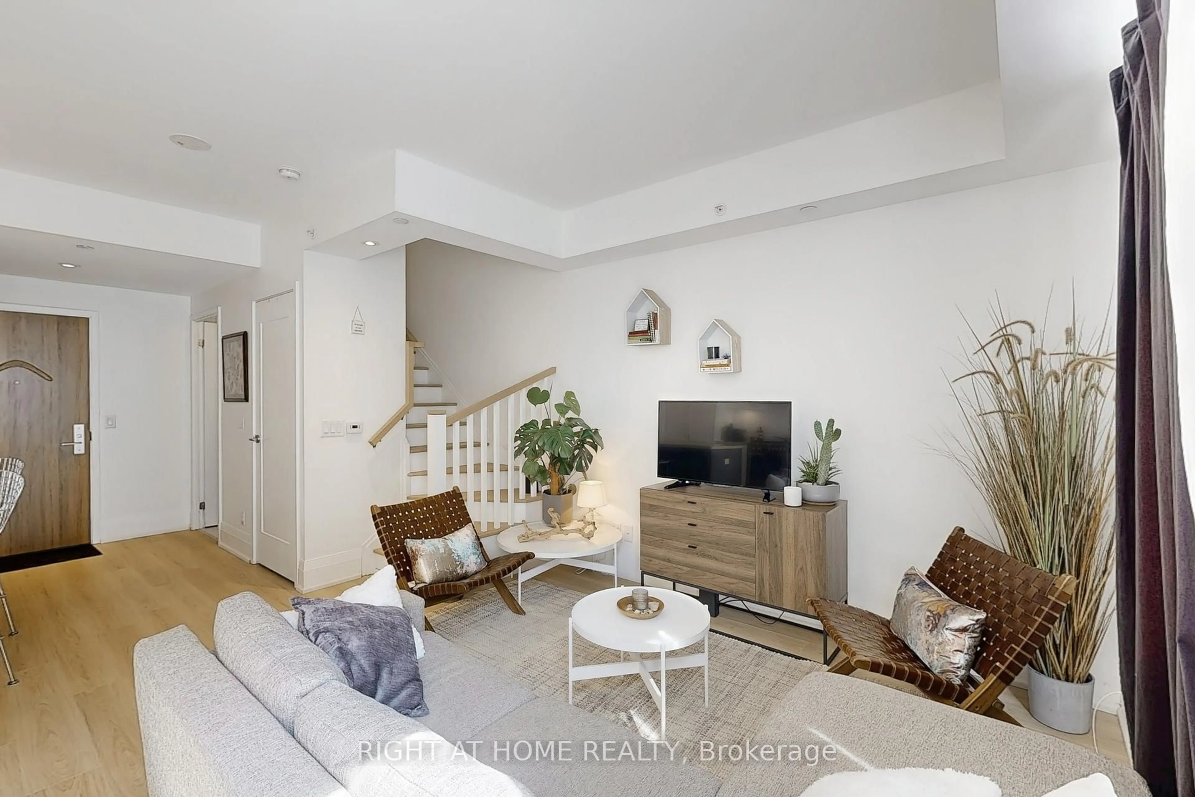 Living room with furniture, unknown for 25 Malcolm Rd #TH-112, Toronto Ontario M4G 0C1