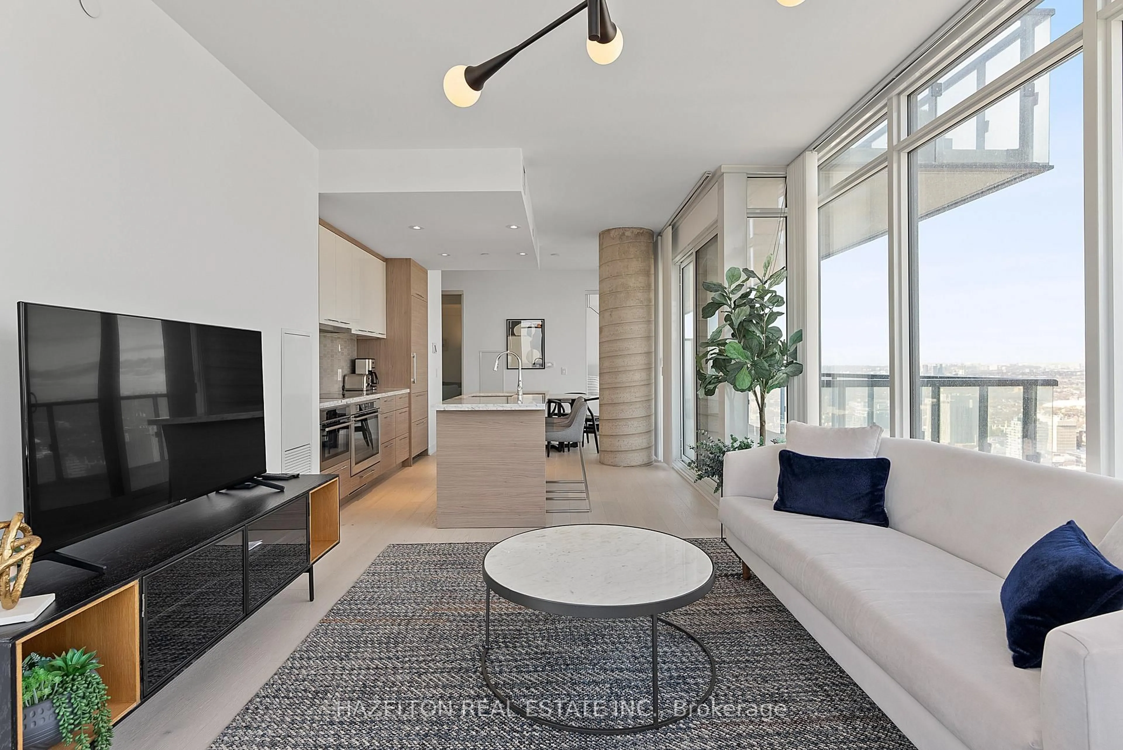 Living room with furniture, unknown for 488 University Ave #3402, Toronto Ontario M5G 0C1