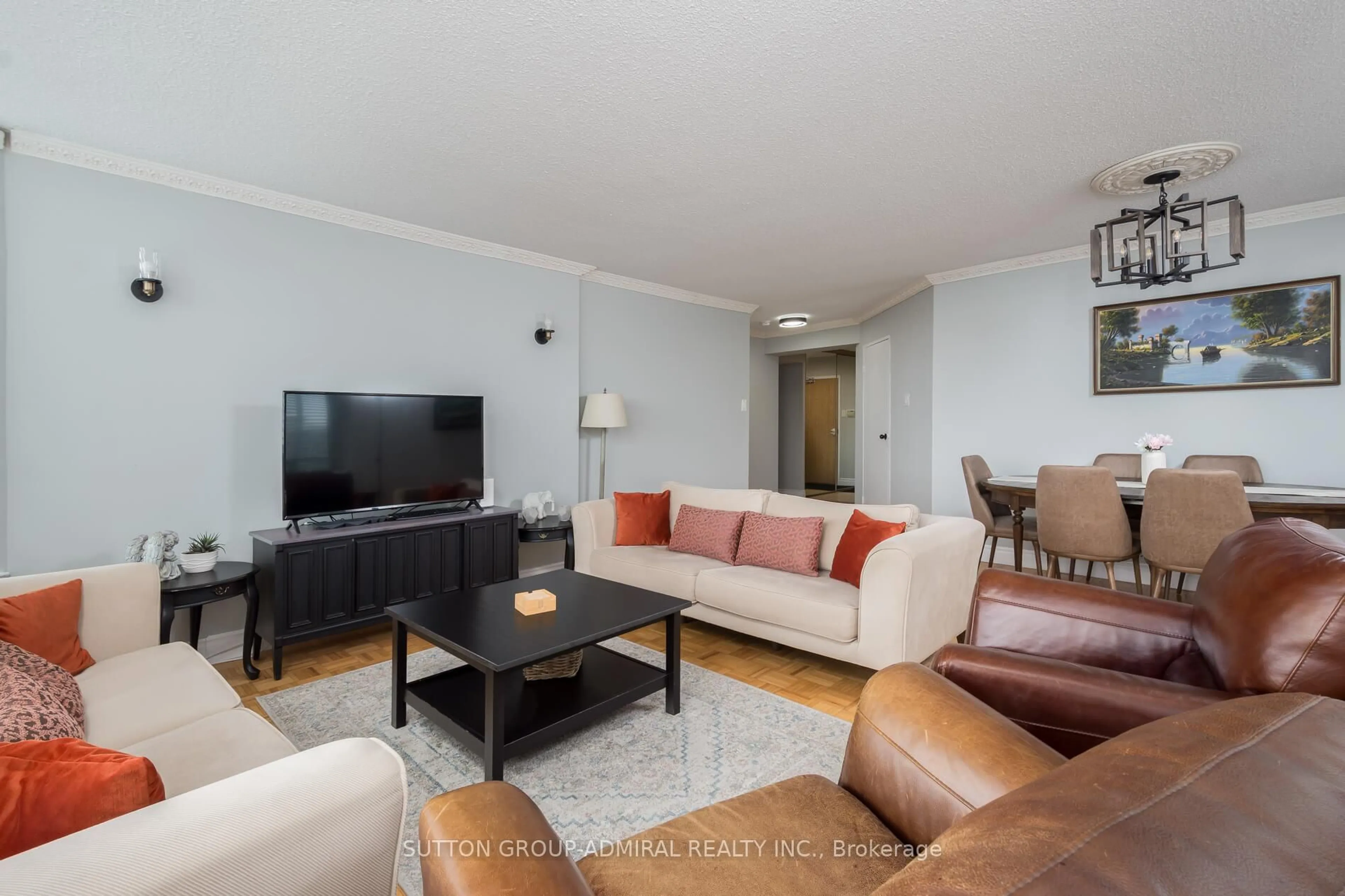 Living room with furniture, wood/laminate floor for 1131 Steeles Ave #1105, Toronto Ontario M2R 3W8
