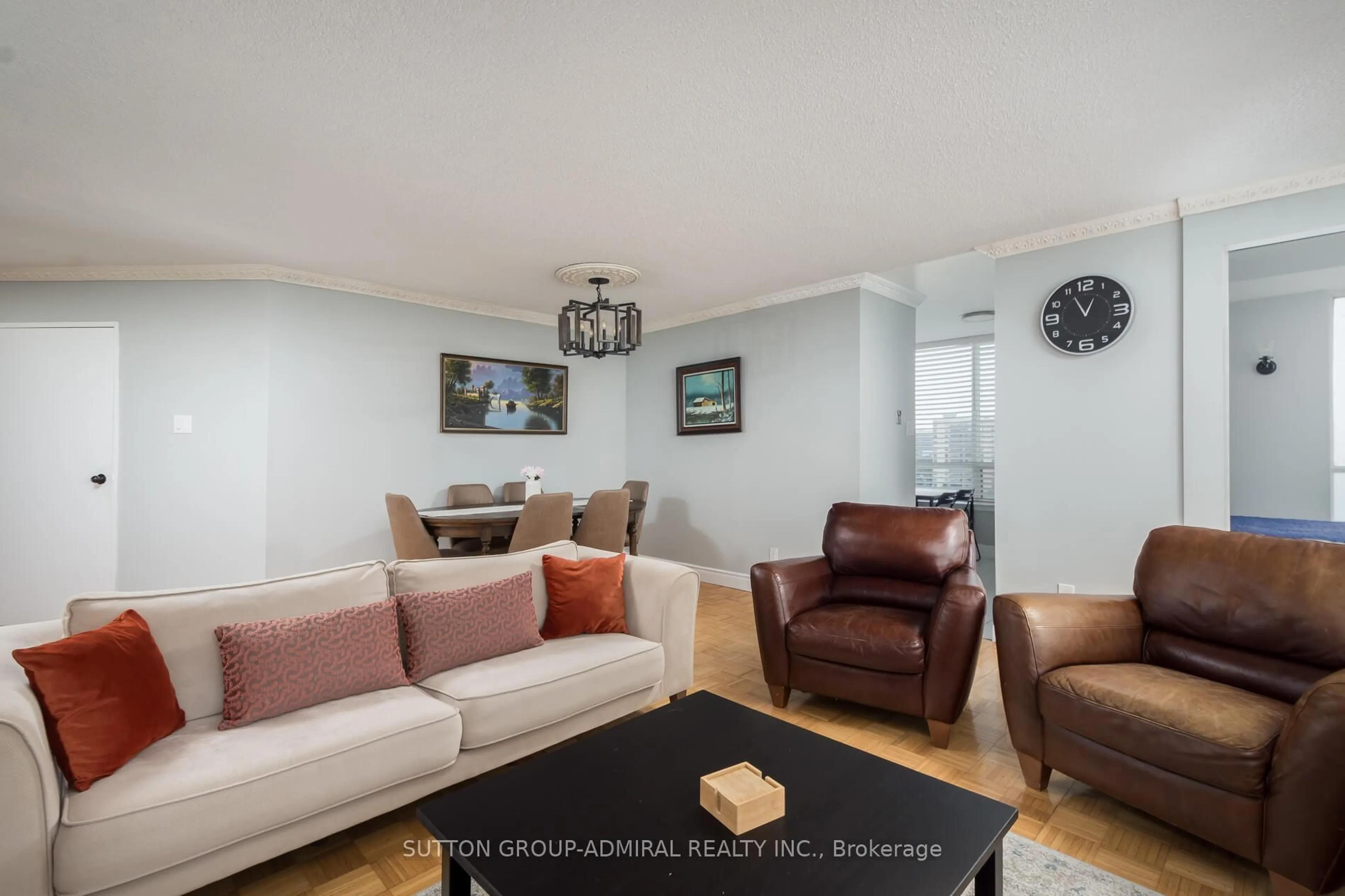 Living room with furniture, wood/laminate floor for 1131 Steeles Ave #1105, Toronto Ontario M2R 3W8