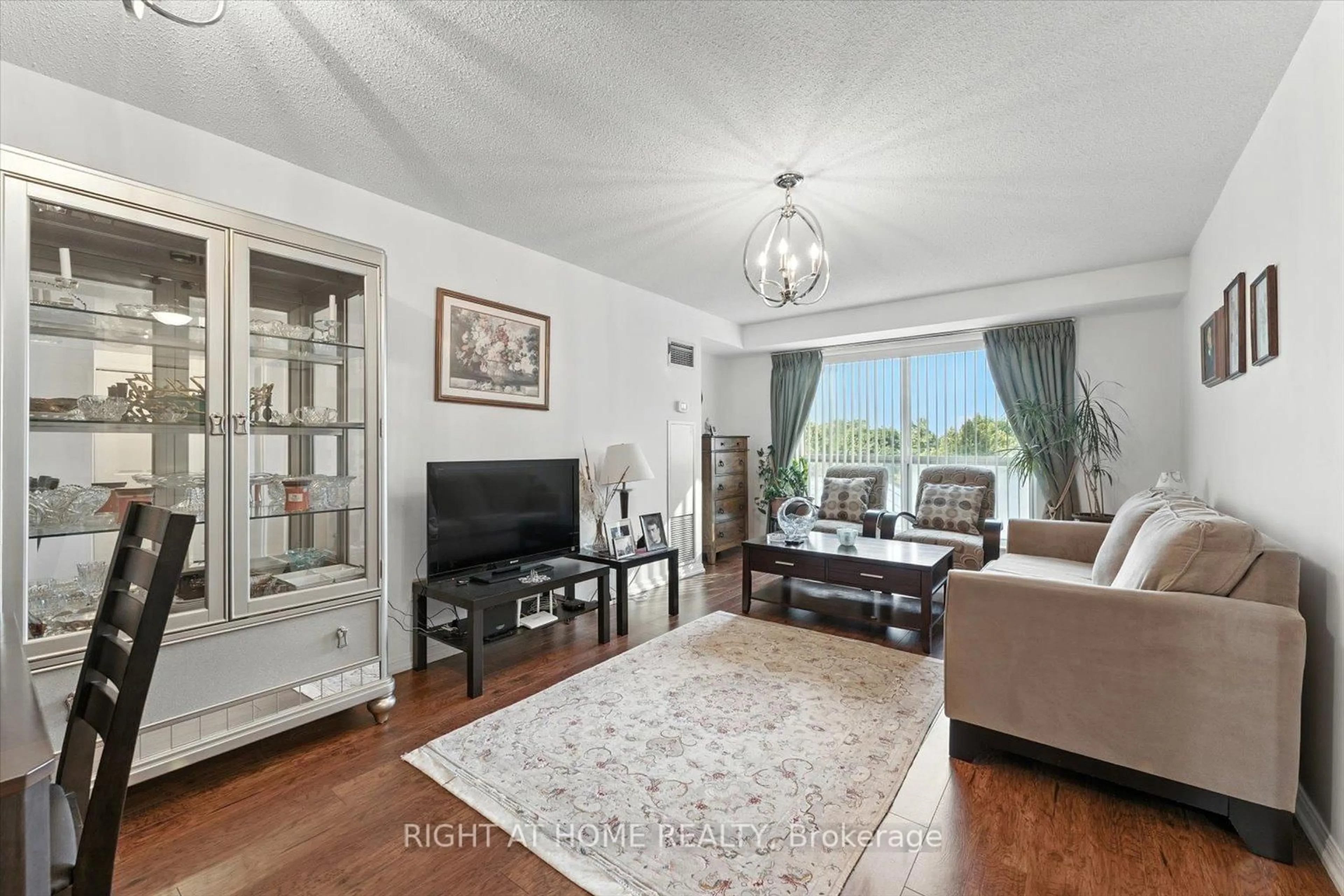 Living room with furniture, unknown for 23 Lorraine Dr #308, Toronto Ontario M2N 6Z6