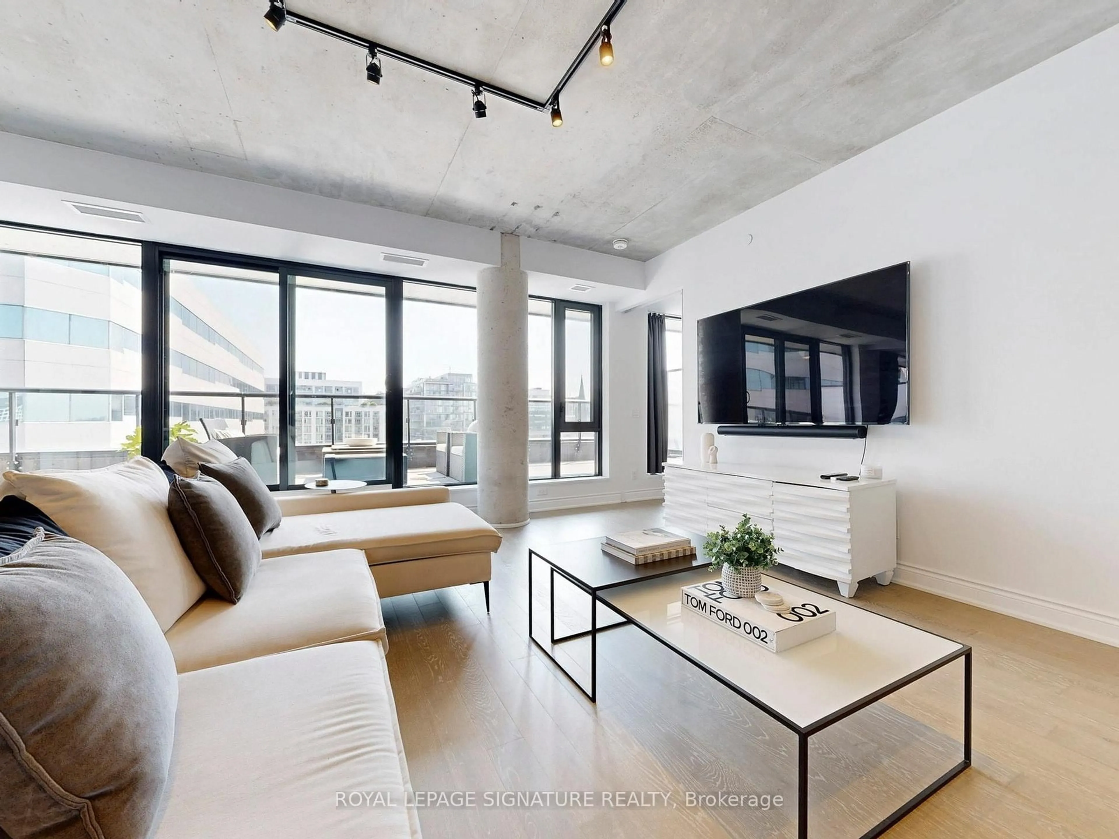 Living room with furniture, cement floor for 608 Richmond St #1105, Toronto Ontario M5V 0N9