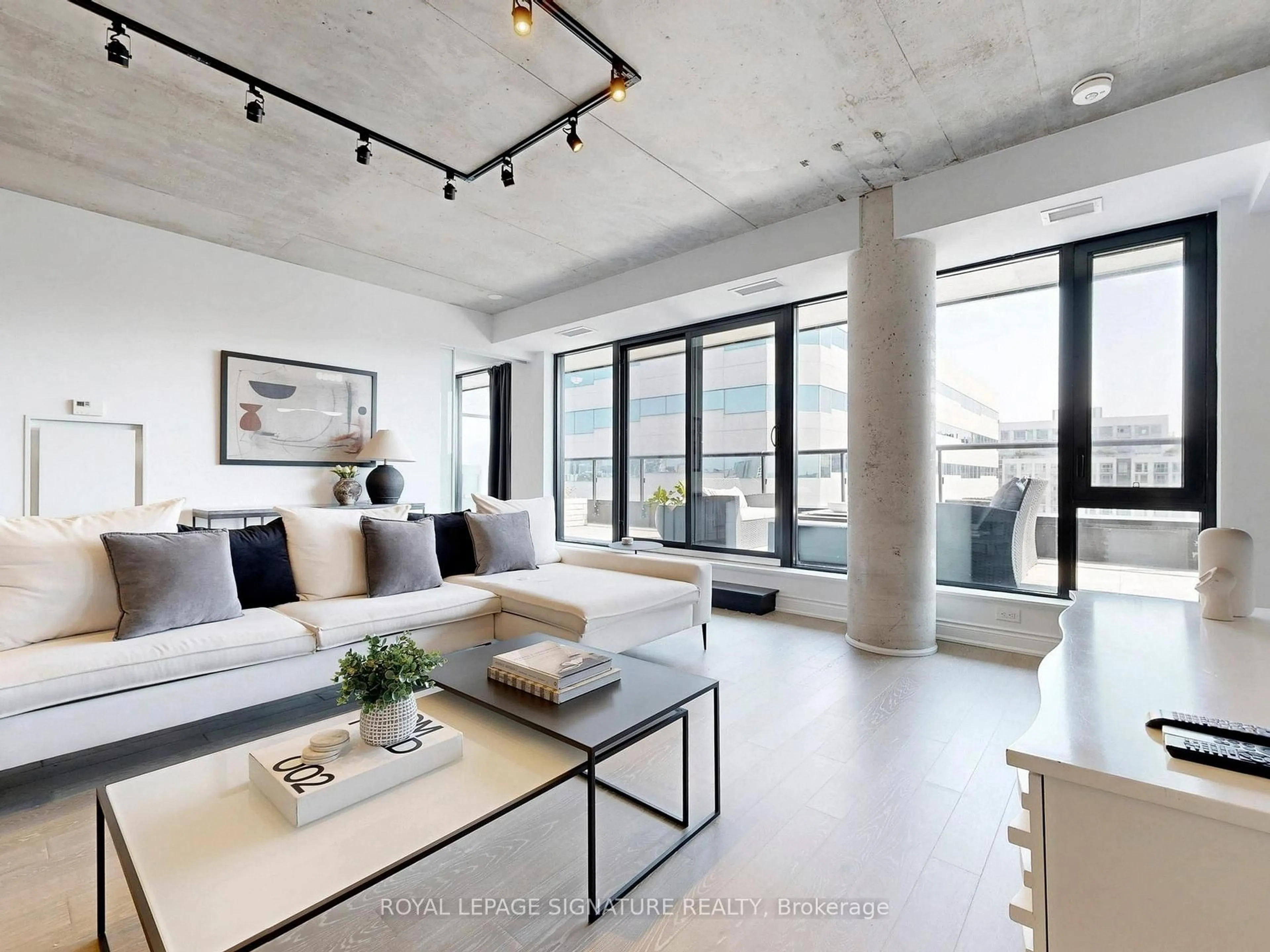 Living room with furniture, cement floor for 608 Richmond St #1105, Toronto Ontario M5V 0N9