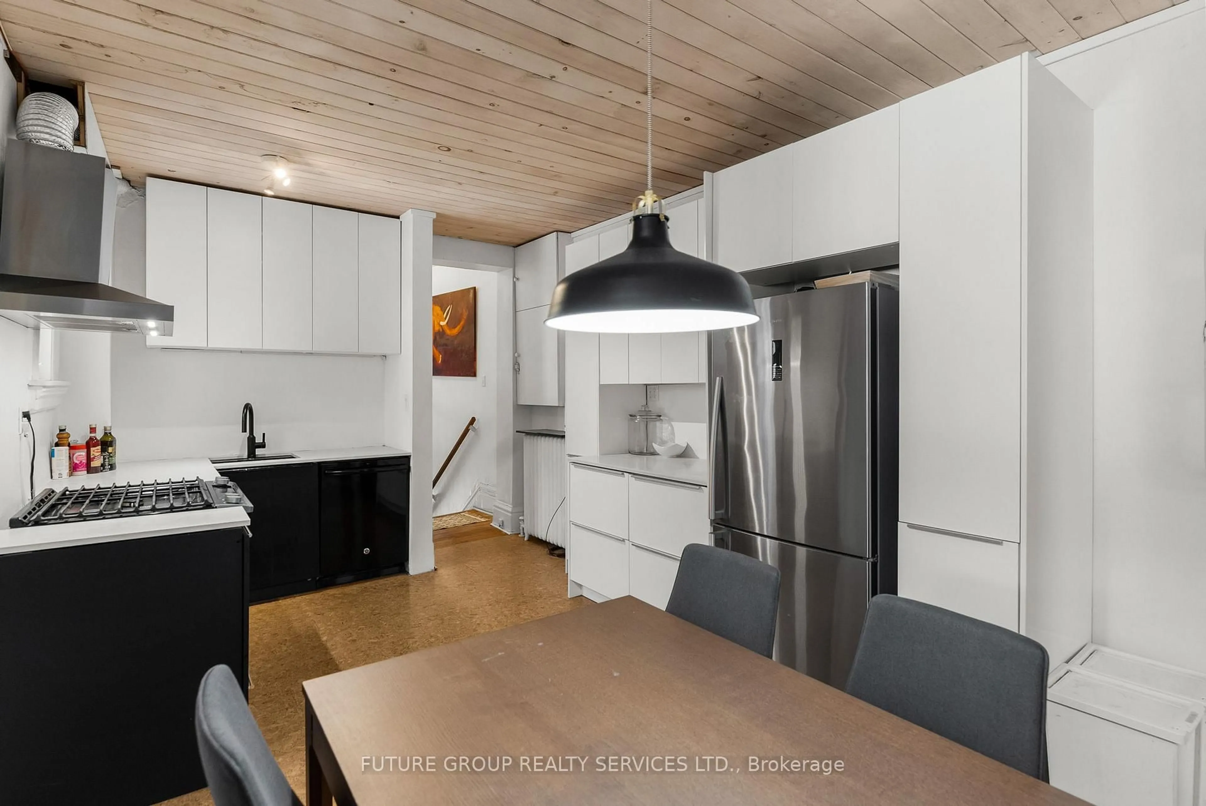 Open concept kitchen, wood/laminate floor for 10 Borden St, Toronto Ontario M5S 2M9