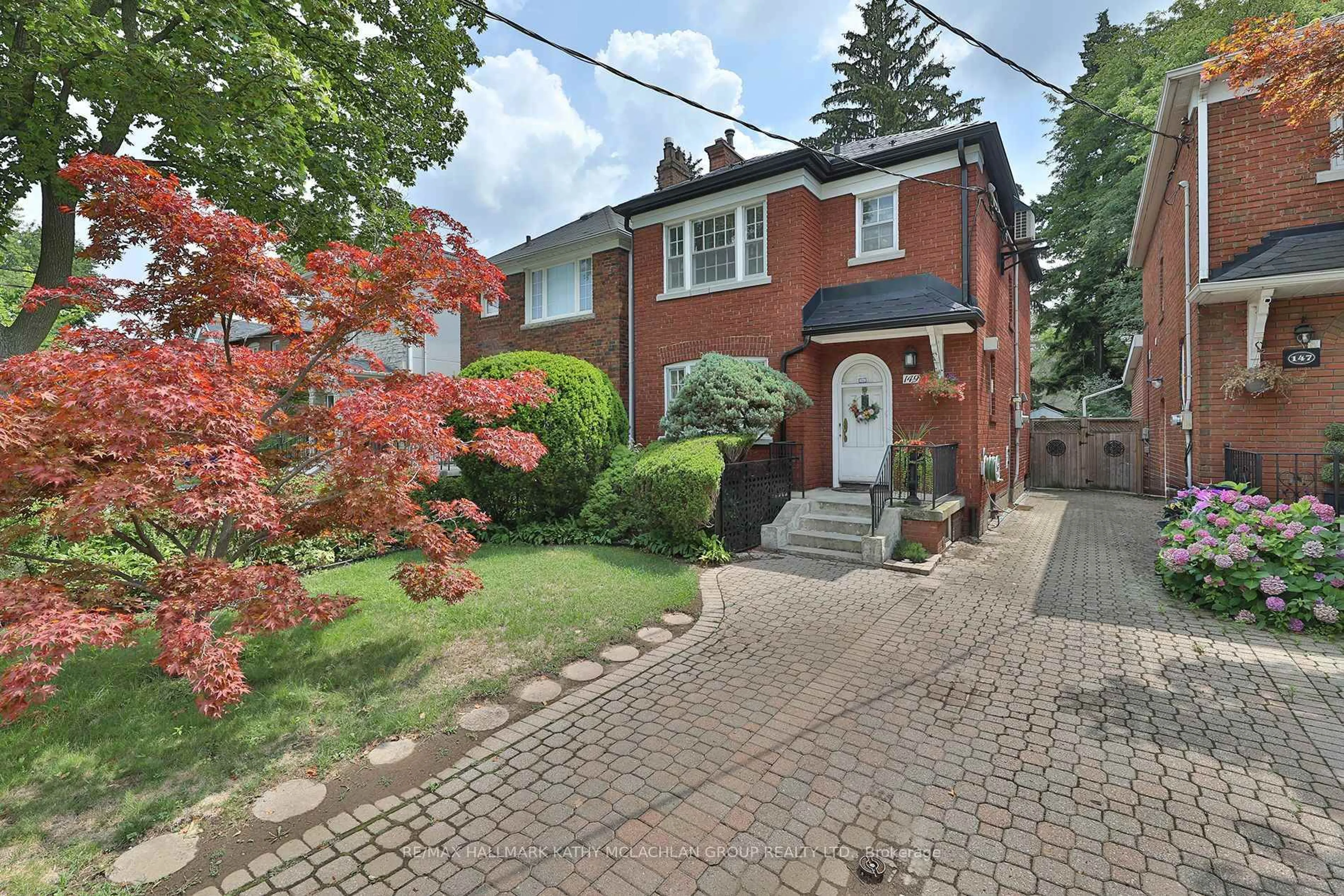 Home with brick exterior material, street for 149 Donlea Dr, Toronto Ontario M4G 2M7