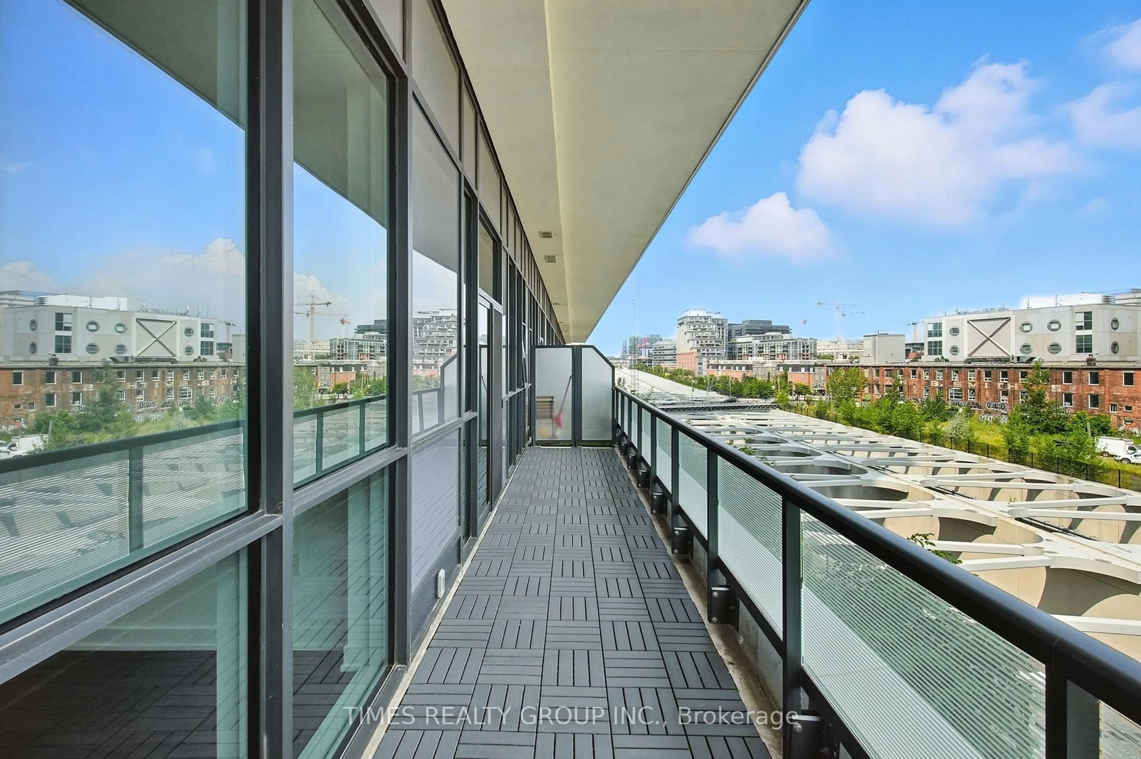Balcony in the apartment, city buildings view from balcony for 50 Ordnance St #413, Toronto Ontario M6K 0C9