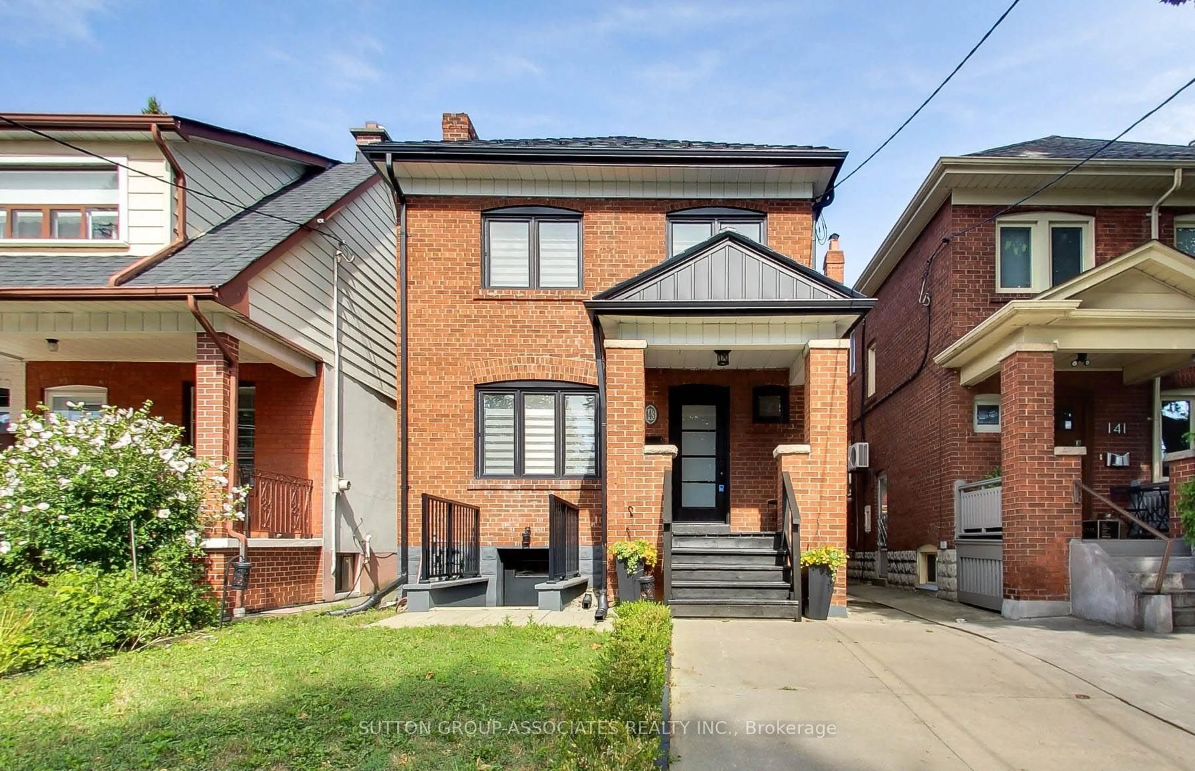 Home with brick exterior material, street for 143 Pinewood Ave, Toronto Ontario M6C 2V6