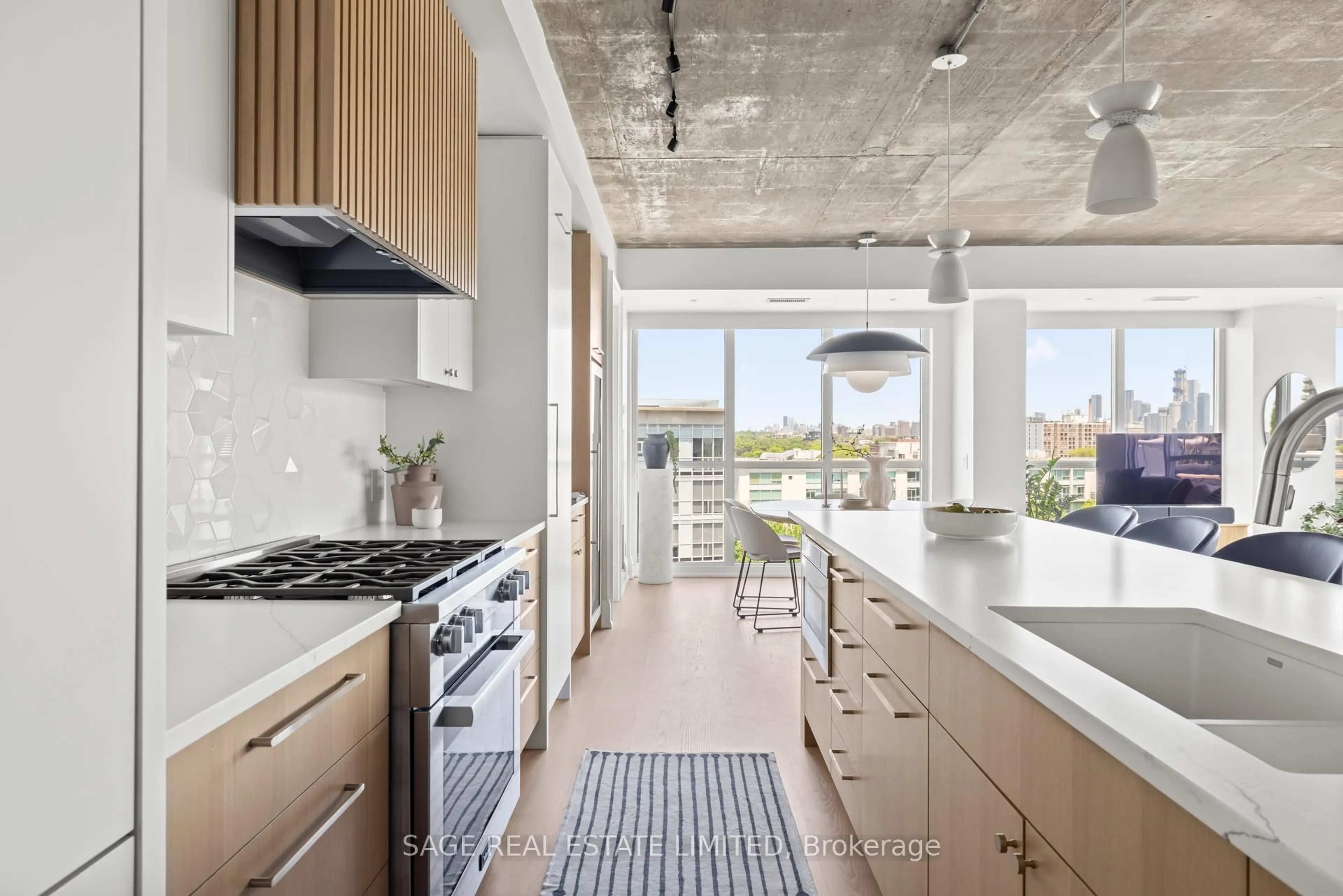 Contemporary kitchen, cement floor for 1 Shaw St #912, Toronto Ontario M6K 0A1