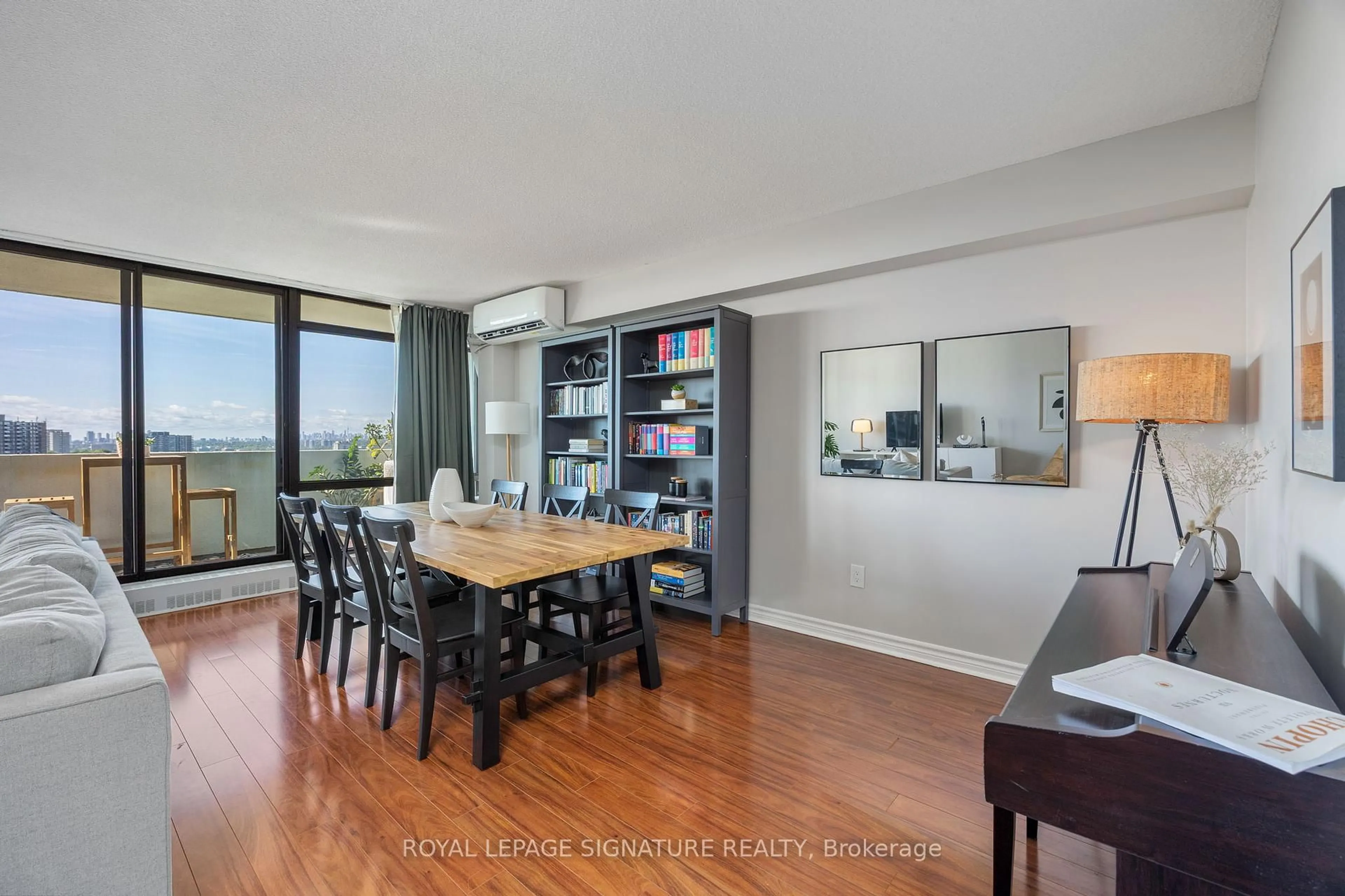 Dining room, wood/laminate floor for 3300 Don Mills Rd #1107, Toronto Ontario M2J 4X7