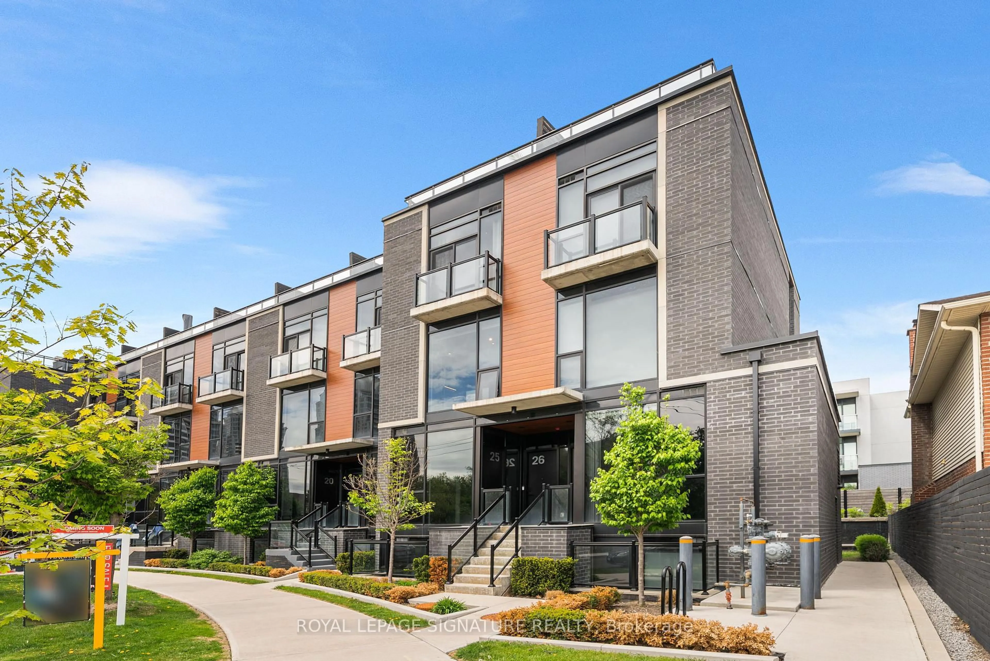 Home with brick exterior material, street for 12 Dervock Cres #26, Toronto Ontario M2K 0G9
