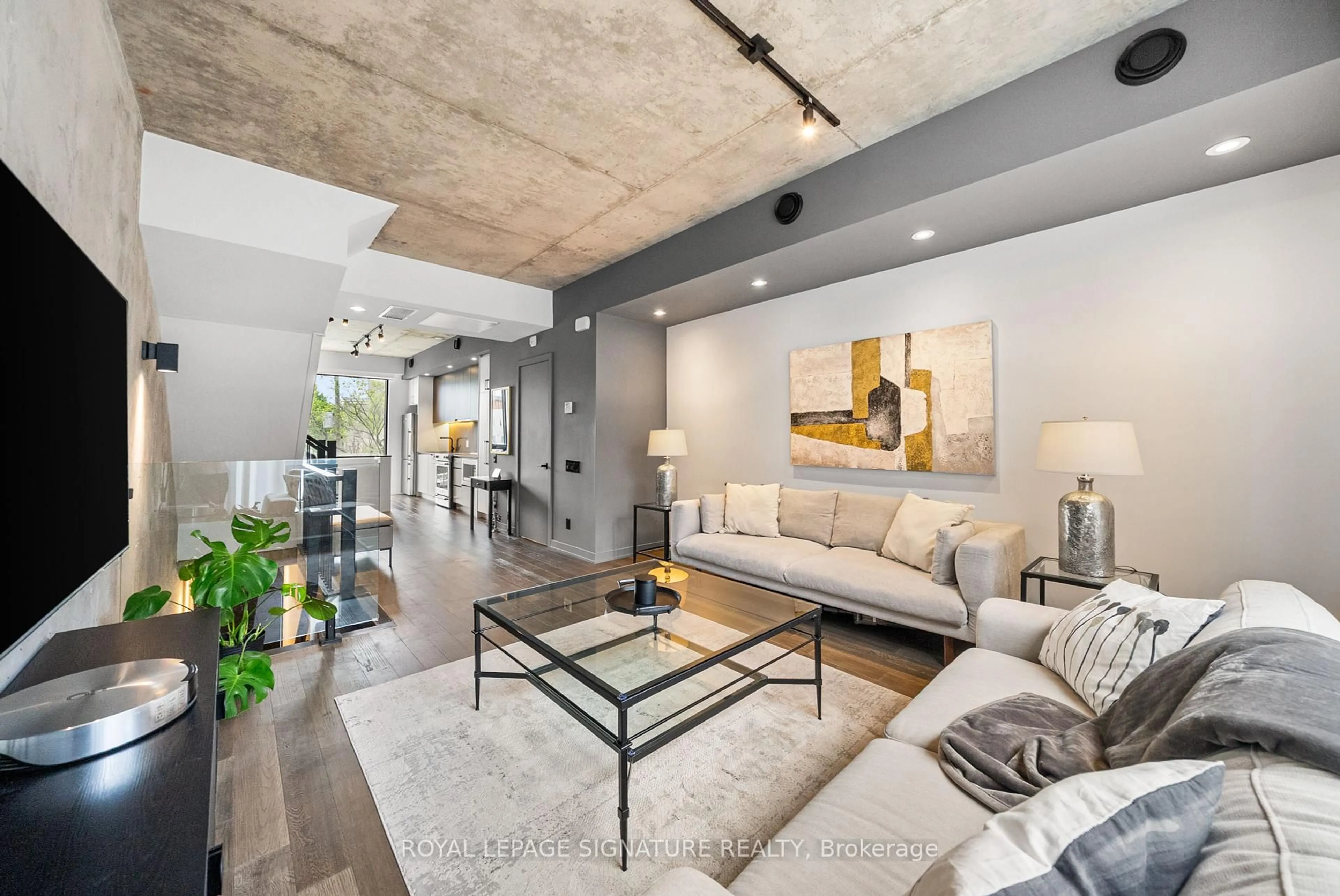 Living room with furniture, cement floor for 12 Dervock Cres #26, Toronto Ontario M2K 0G9