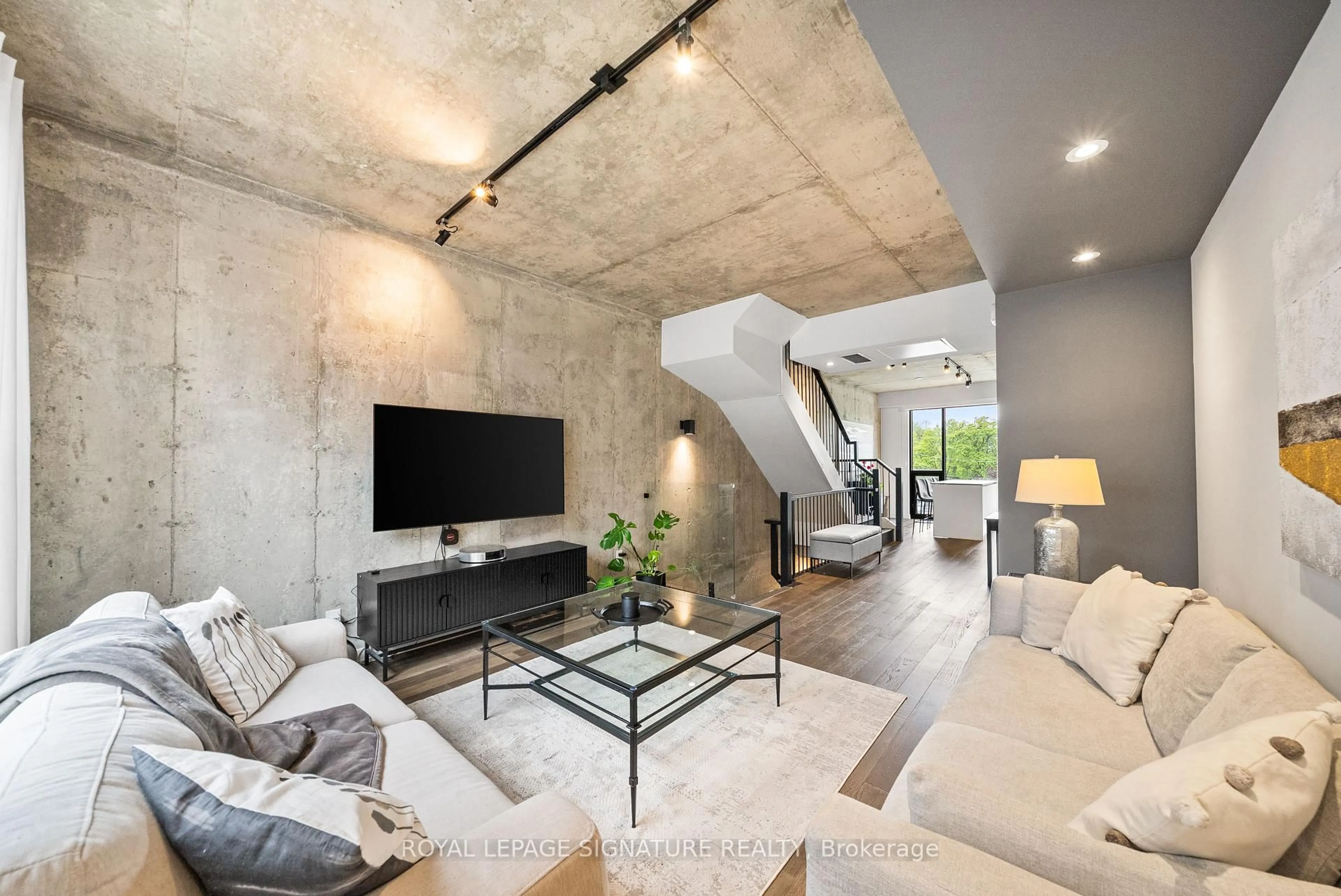 Living room with furniture, cement floor for 12 Dervock Cres #26, Toronto Ontario M2K 0G9