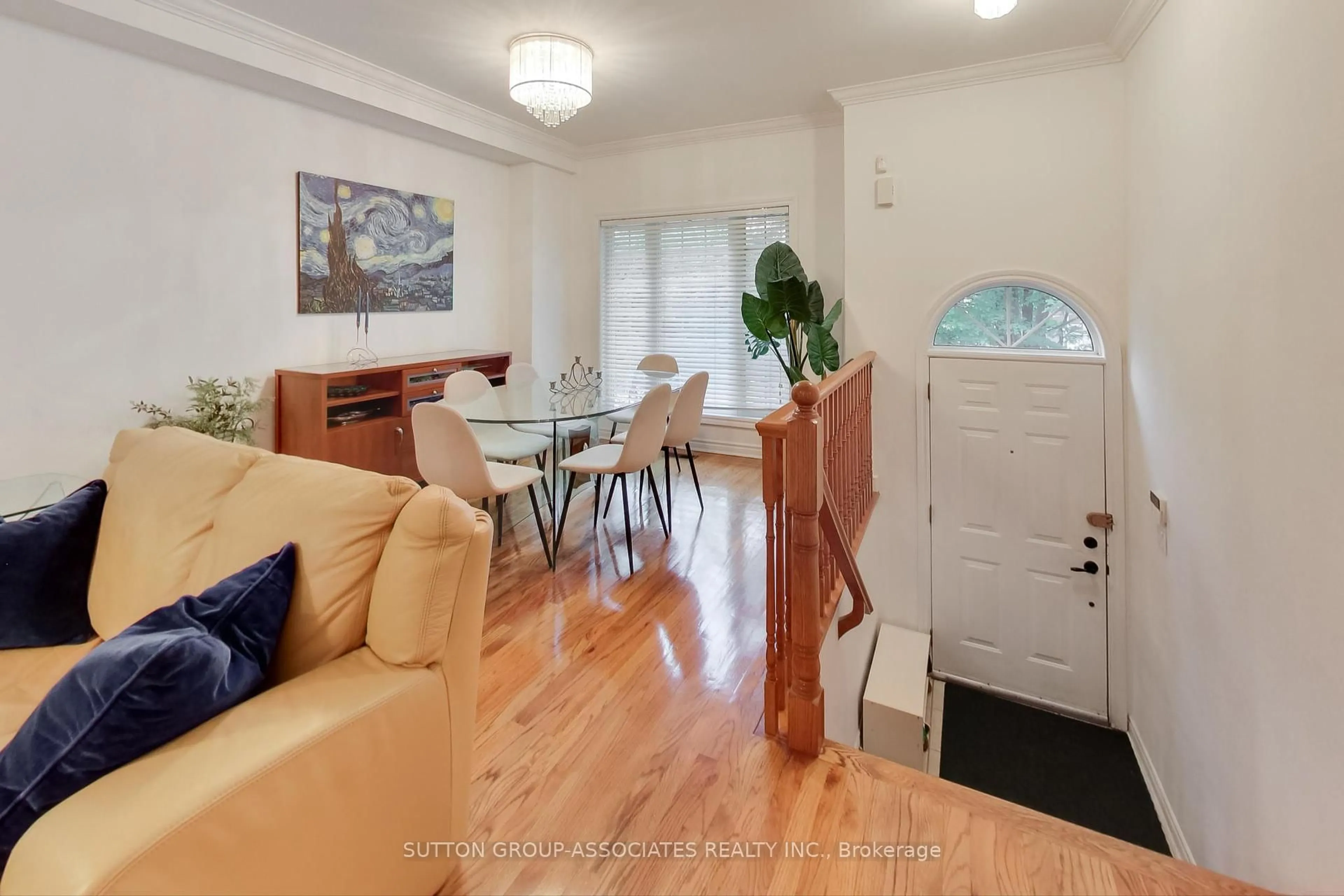Living room with furniture, wood/laminate floor for 15B Robina Ave, Toronto Ontario M6C 3Y4