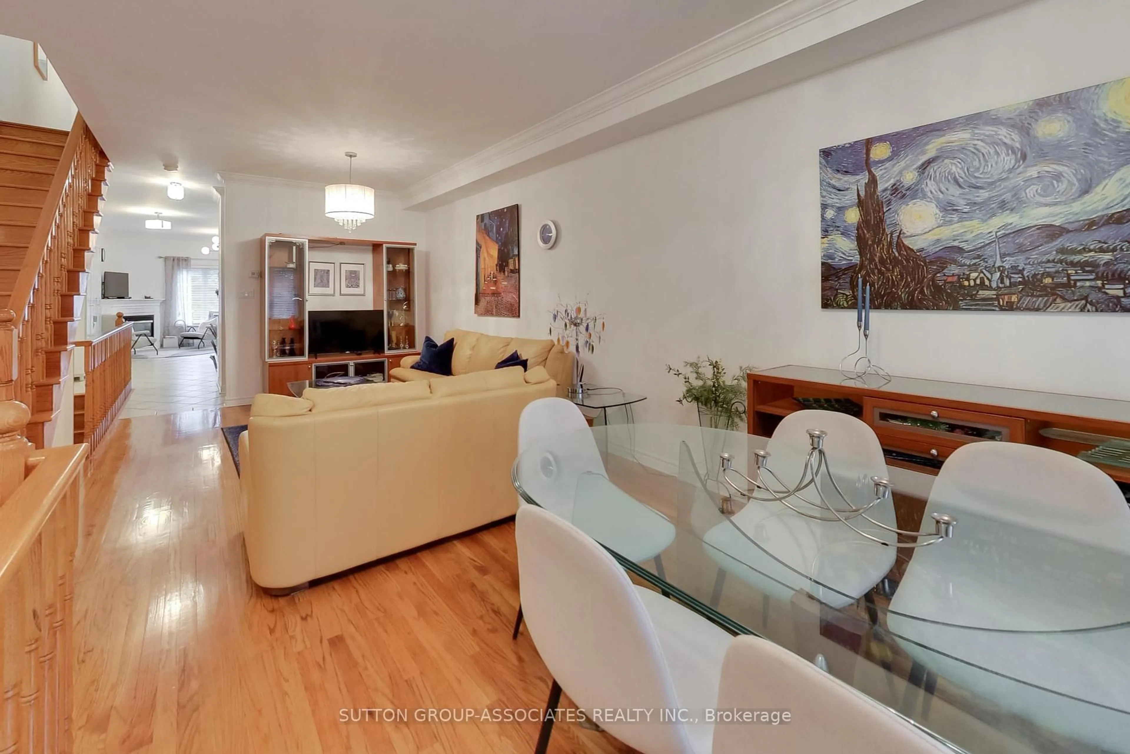 Living room with furniture, wood/laminate floor for 15B Robina Ave, Toronto Ontario M6C 3Y4