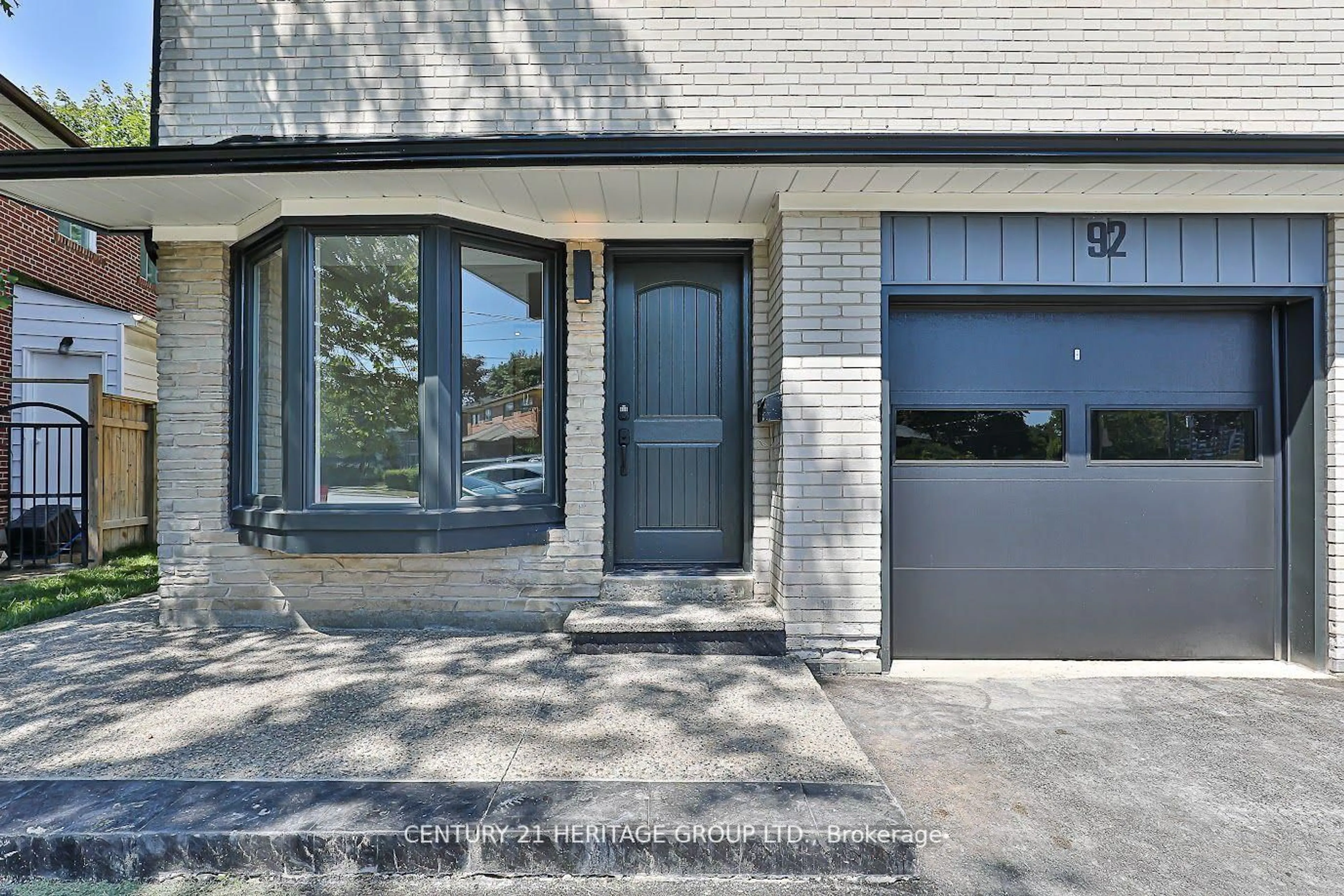 Home with brick exterior material, street for 92 Tanjoe Cres, Toronto Ontario M2M 1P7