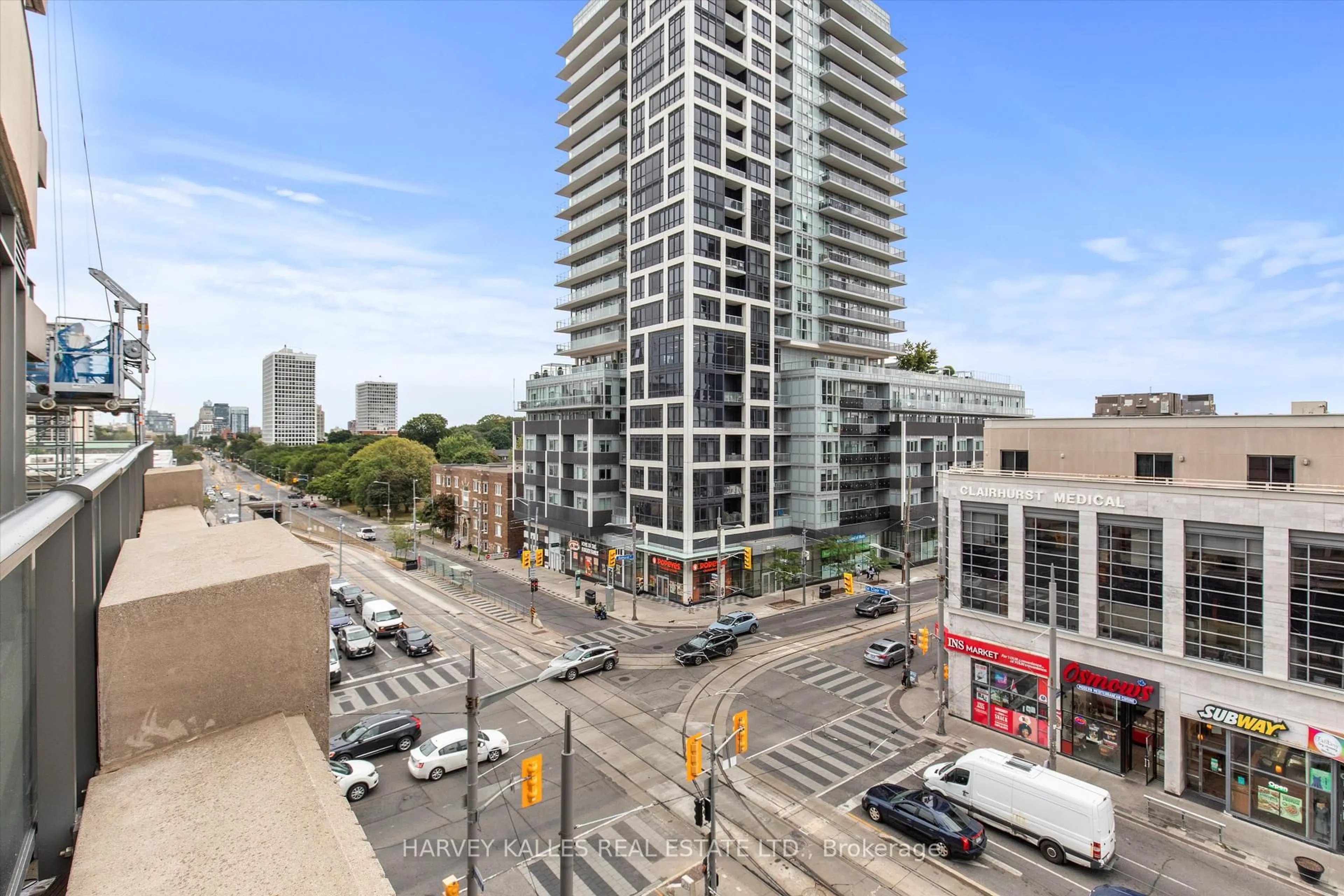 A pic from outside/outdoor area/front of a property/back of a property/a pic from drone, city buildings view from balcony for 500 St Clair Ave #408, Toronto Ontario M6C 1A8
