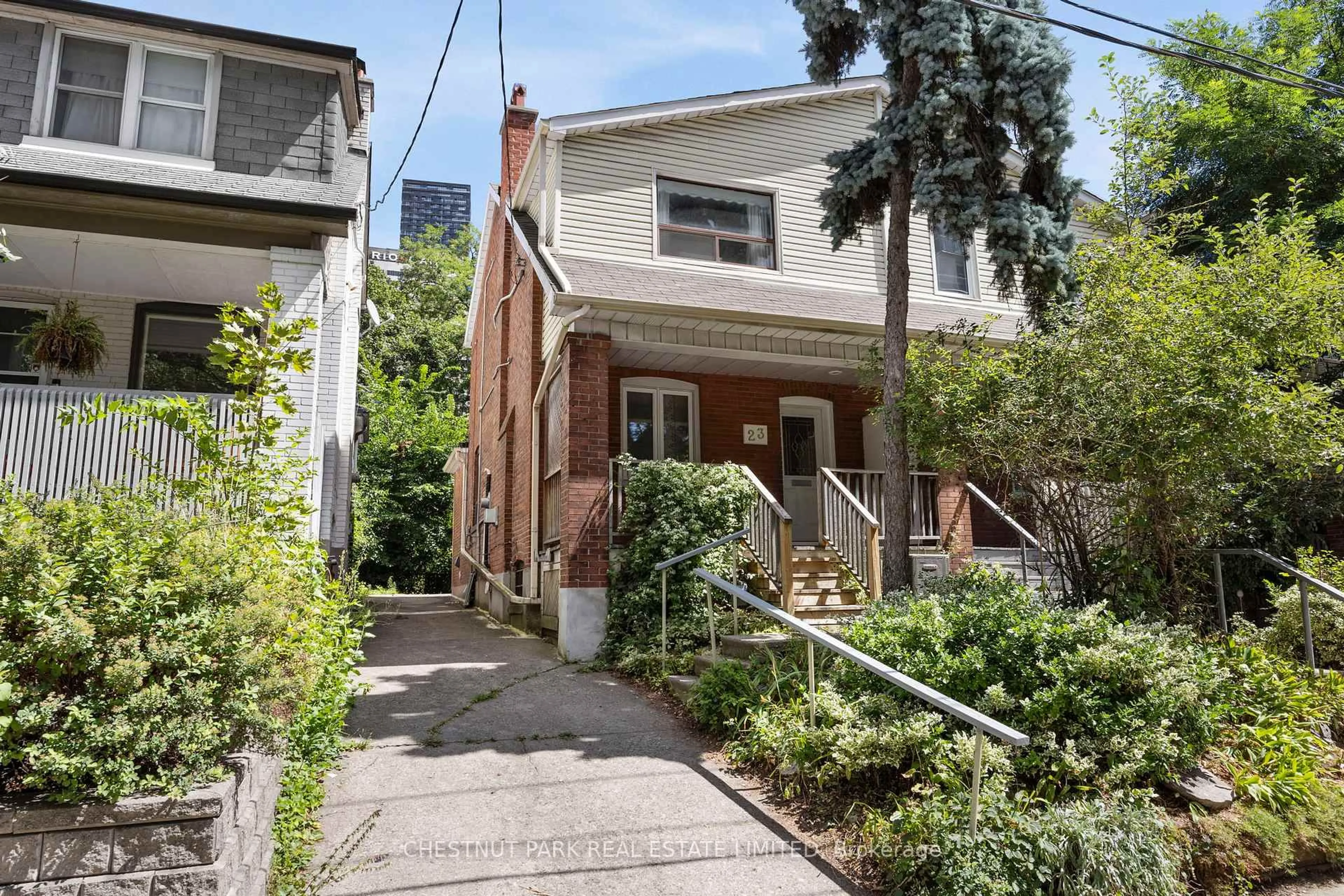 Home with brick exterior material, street for 23 Edith Dr, Toronto Ontario M4R 1Y9