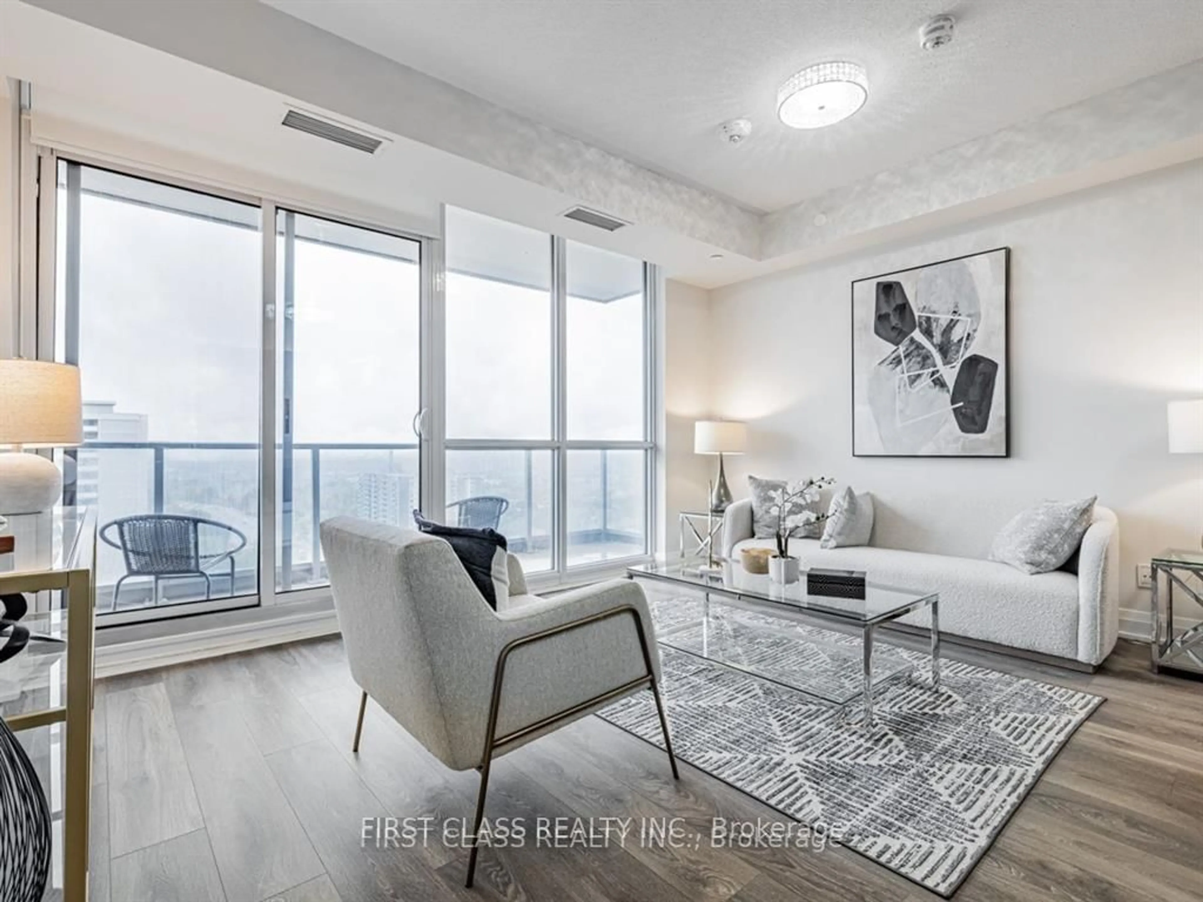 Living room with furniture, unknown for 36 Forest Manor Rd #1003, Toronto Ontario M2J 1M5