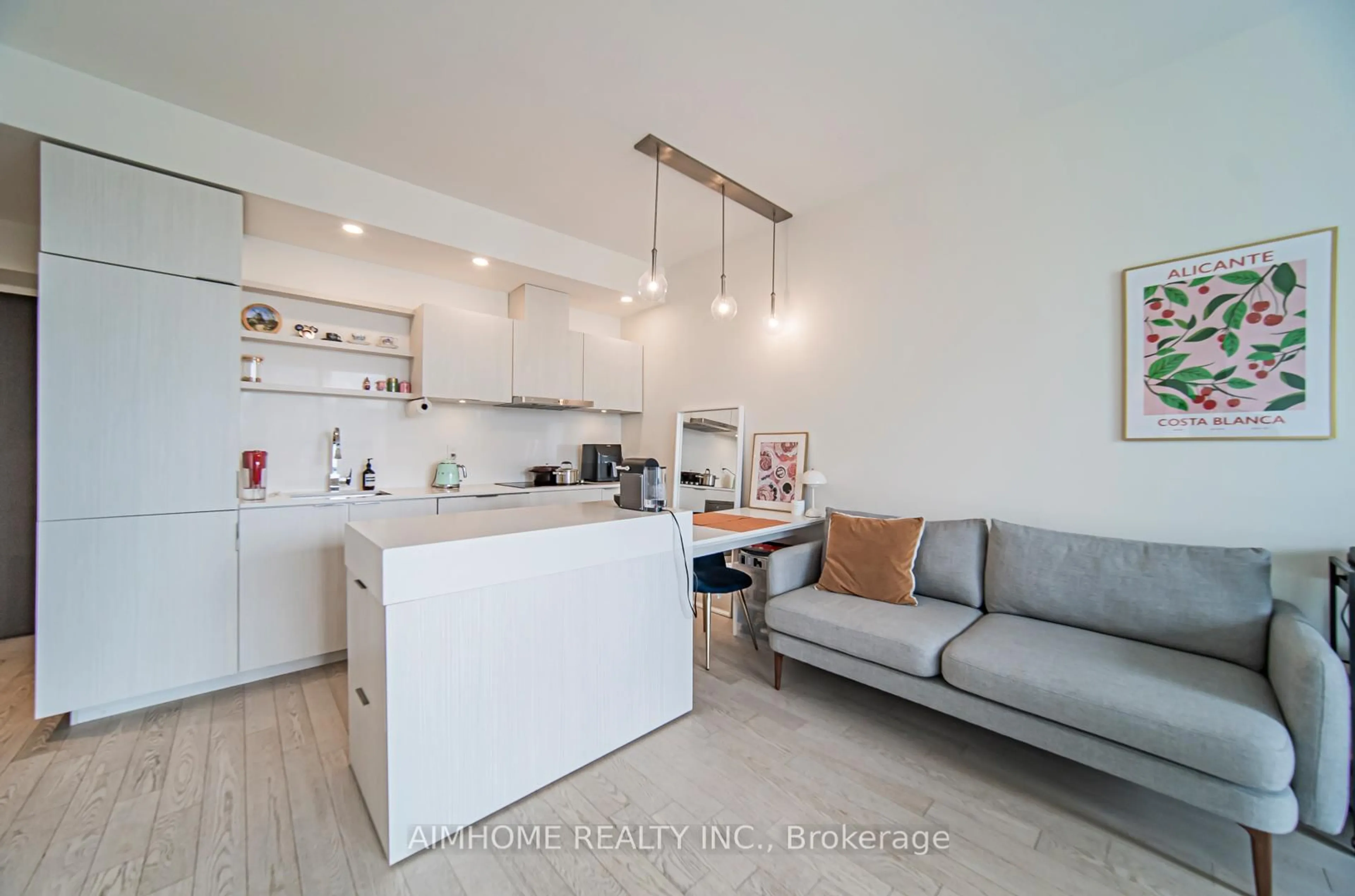 Open concept kitchen, wood/laminate floor for 16 Bonnycastle St #1210, Toronto Ontario M5A 0C9